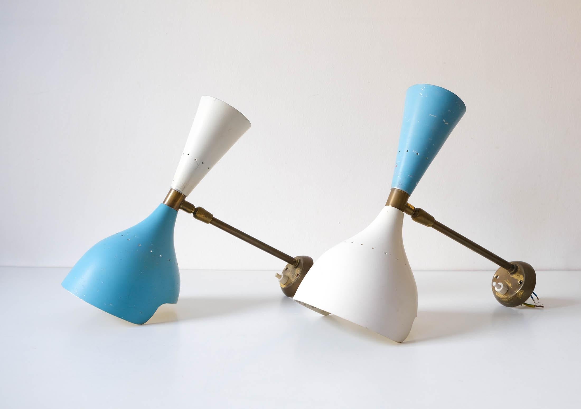 For sale a beautiful pair of original Mid-Century Modernist Italian double-cone 