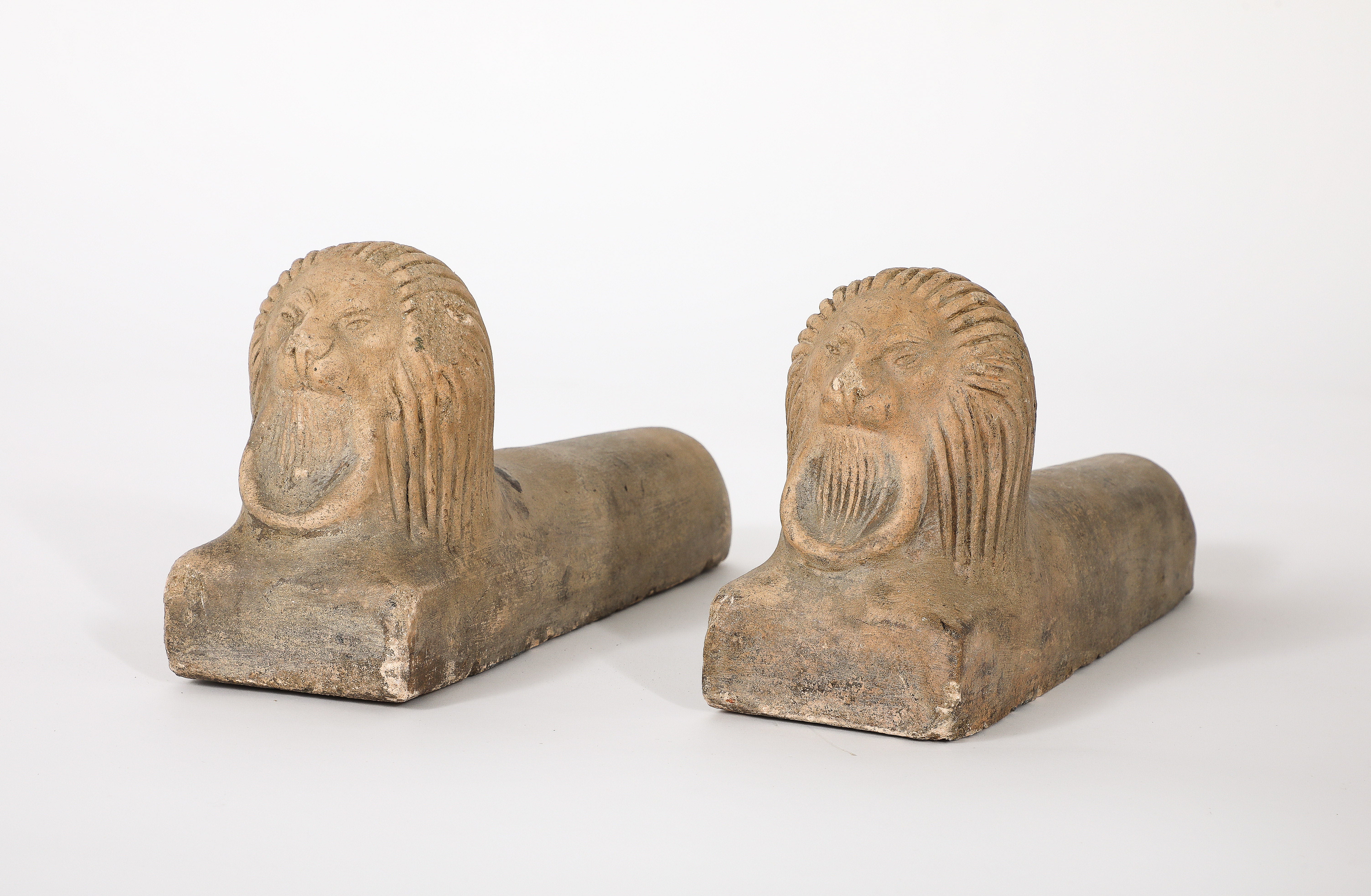 A charming and whimsical pair of Italian hand-carved stone lions. 
Italy, early 20th century 
Size: 6