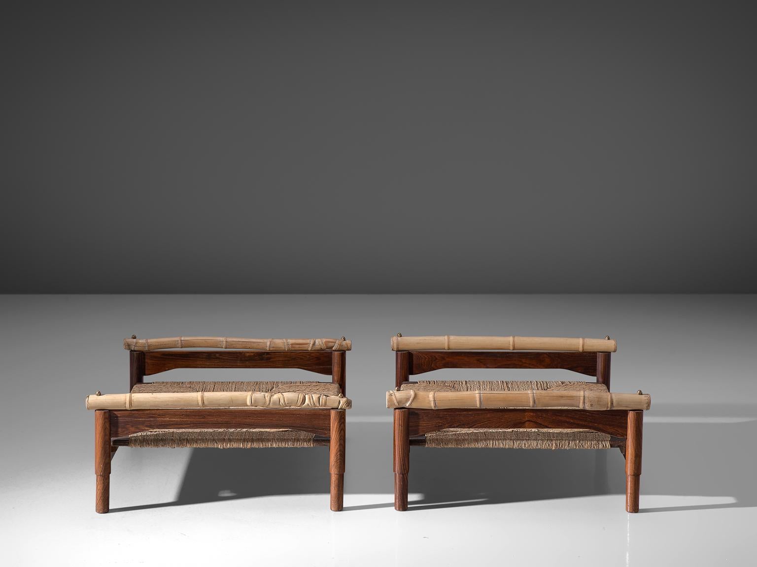 Benches or stools, rosewood, cane, bamboo, Italy, 1960s.

These midcentury stools are made of rosewood, cane and bamboo are very sculptural and robust. Their design is as such that it is very low to the ground. The materials are warm and natural