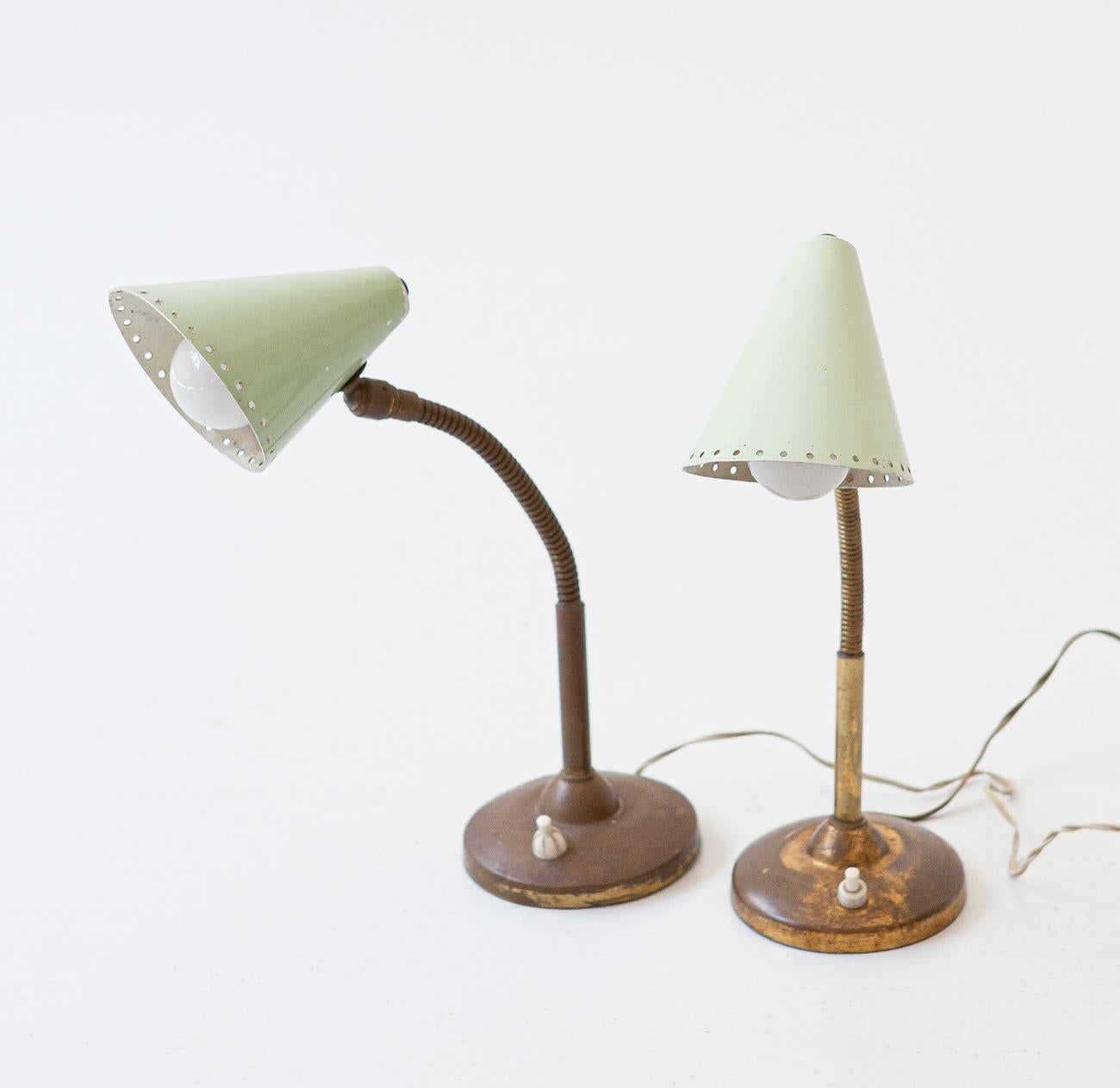 Pair of vintage table or desk lamps manufactured in Italy during the 1950s

Original working wire with standard E14 bulbs.