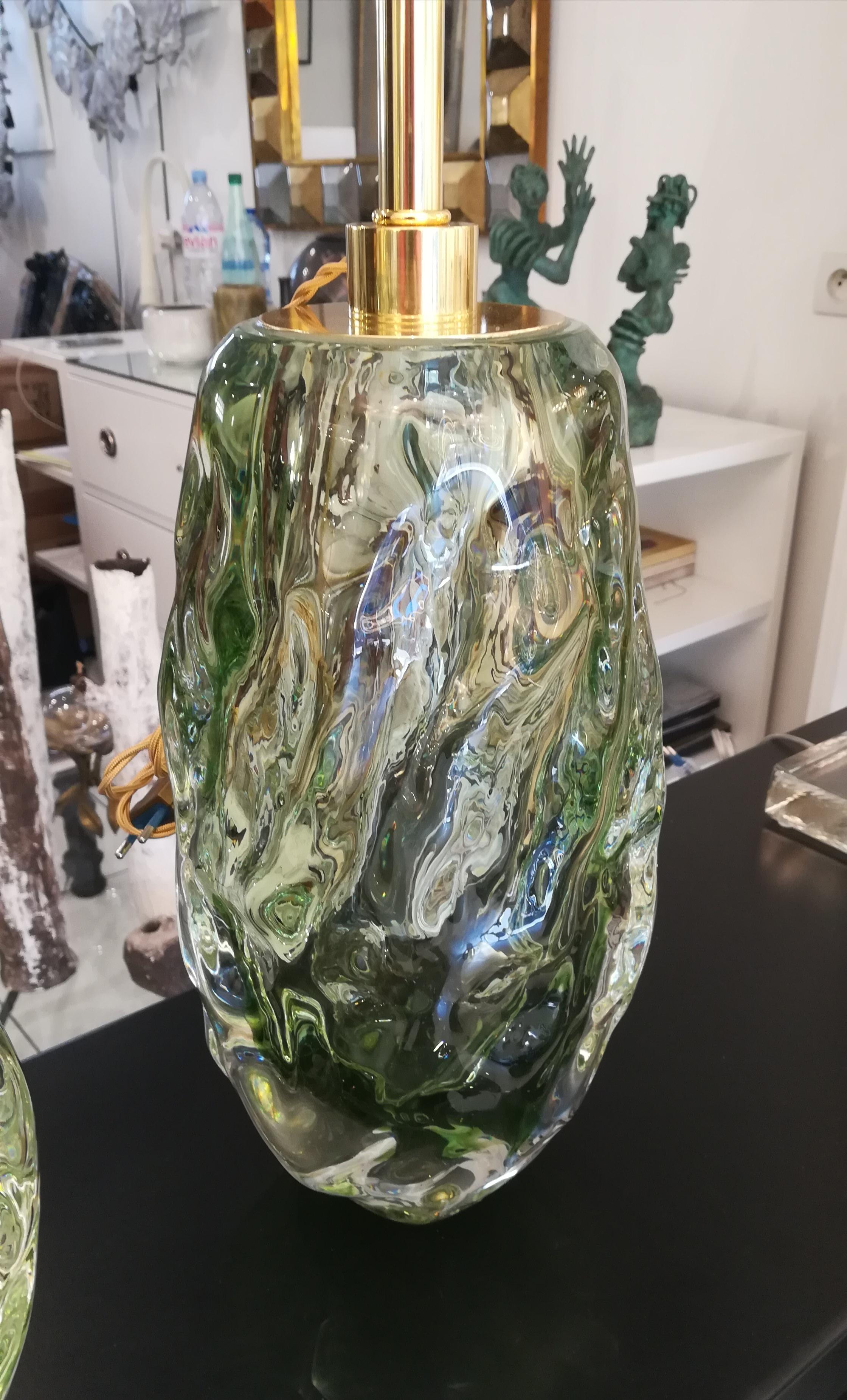 Pair of Italian table lamps in light green Murano glass.
E27 bulbs compatible US E26


 