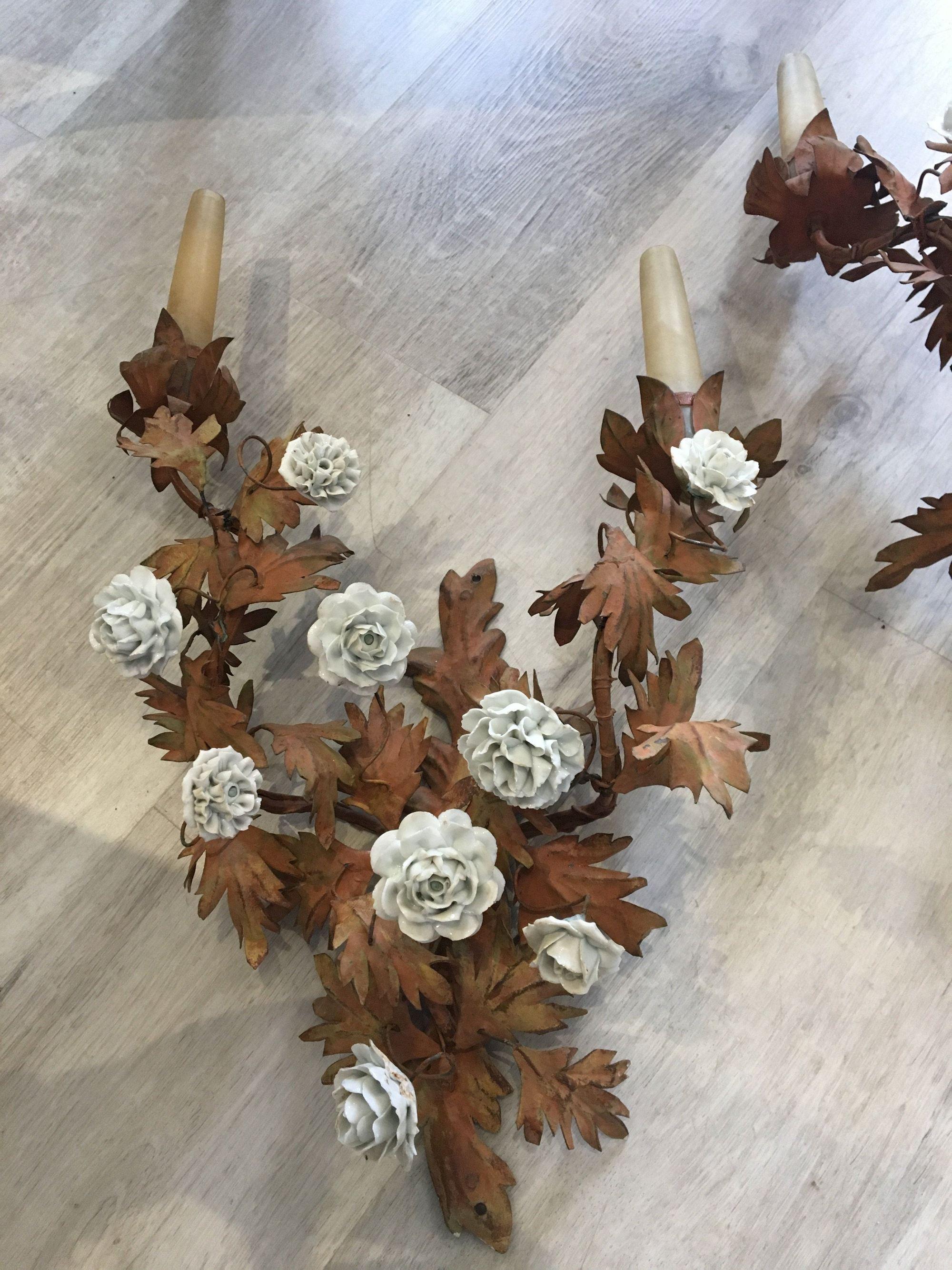 A pair of 19th century French tole and porcelain sconces, wired but not tested, no plugs. Can easily be made functional. Originally for candles. Found in Provence, France.