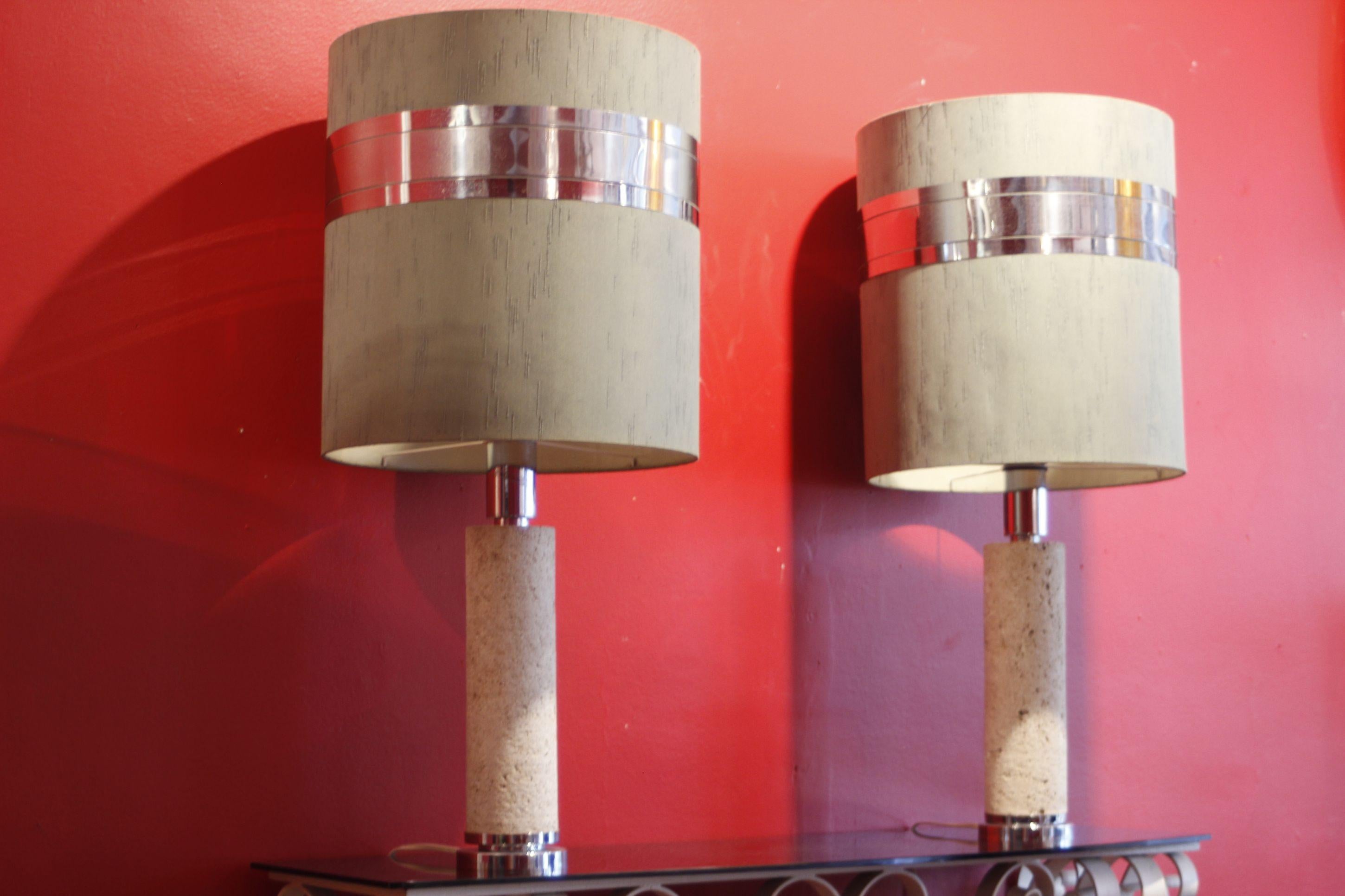 Pair of tall table lamps with large original lampshades by CE.VA Study, Firenze Italy circa 1970. 

The base is in turned travertine, mounted on a chromed steel base, the bulb fitting is also adorned with chromed steel, the lampshades are the