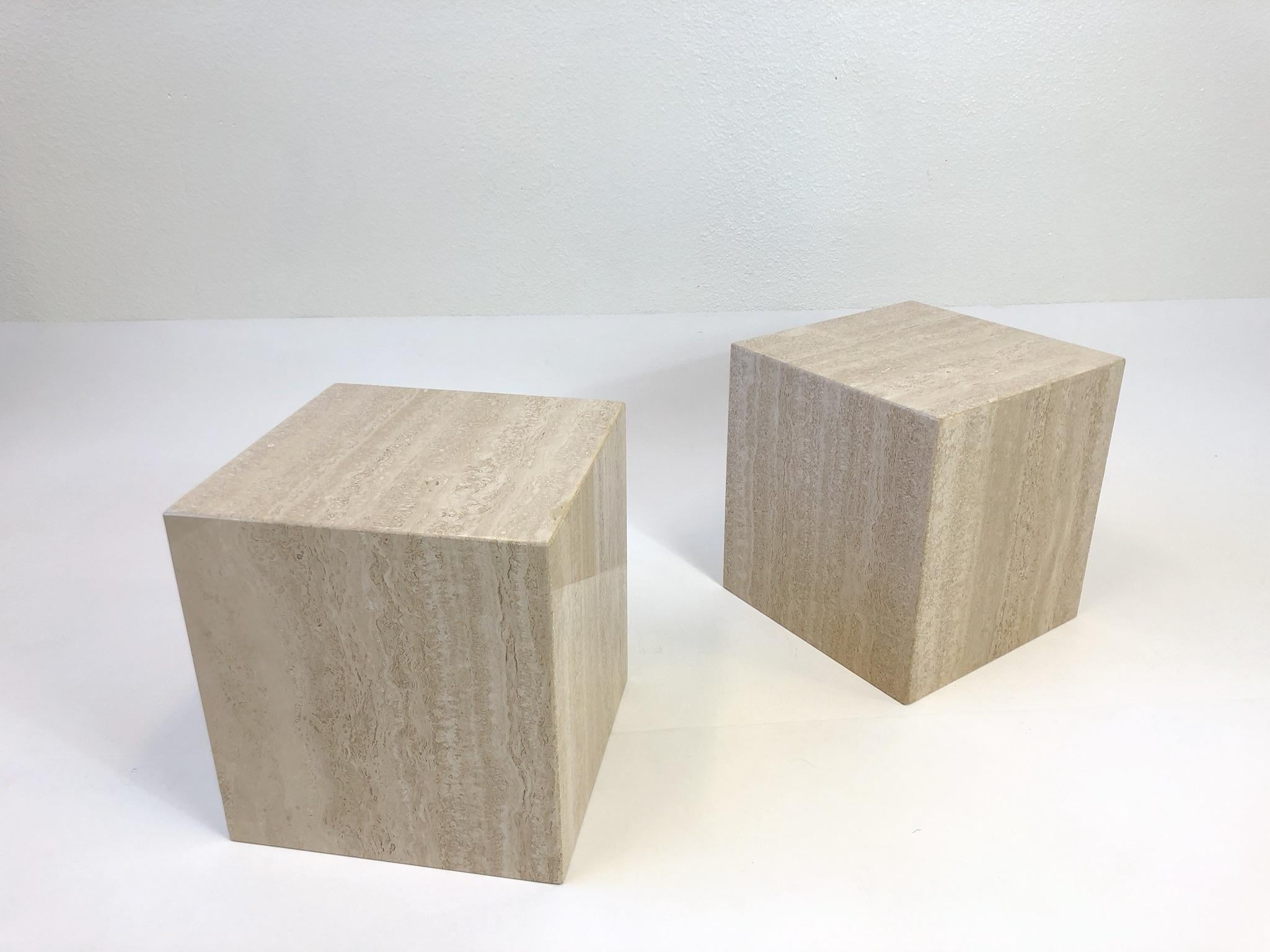 A beautiful pair of polish Italian travertine side tables from the 1970s. The tables have been newly professionally polished. If you want a dull matte finish we can do that.
Dimensions: 13.75” wide 13.75” deep 14.5” high.