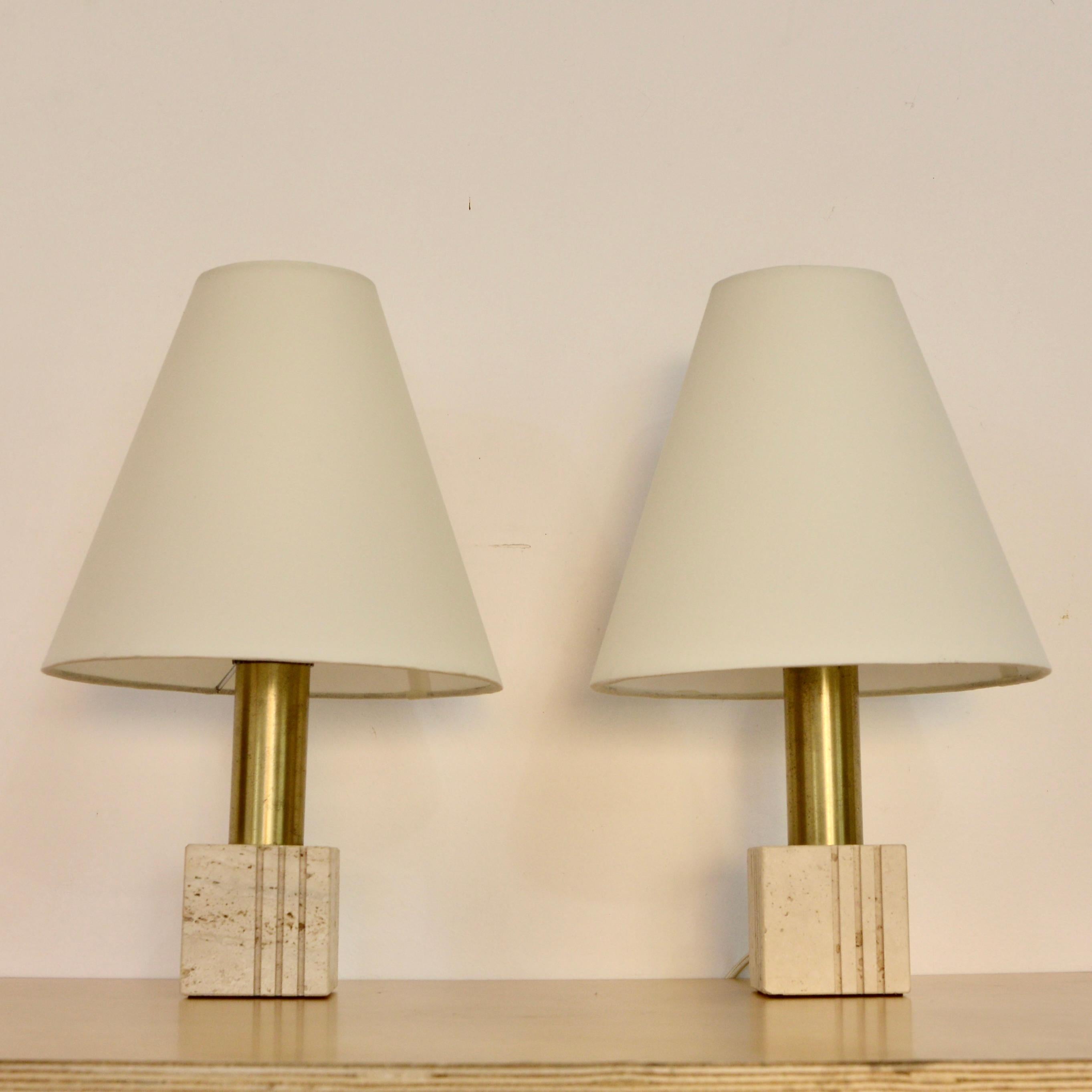 Vintage 1960s travertine Italian table lamps with brass stem, and fabric lamp shade. Fully rewired with a single E26 medium based sockets, ready to be used in the USA. Sold as a pair, lightbulbs included with order. 
Measurements:
Height: