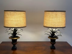 Pair of Italian Urn Form Lamps With Foliage Motifs