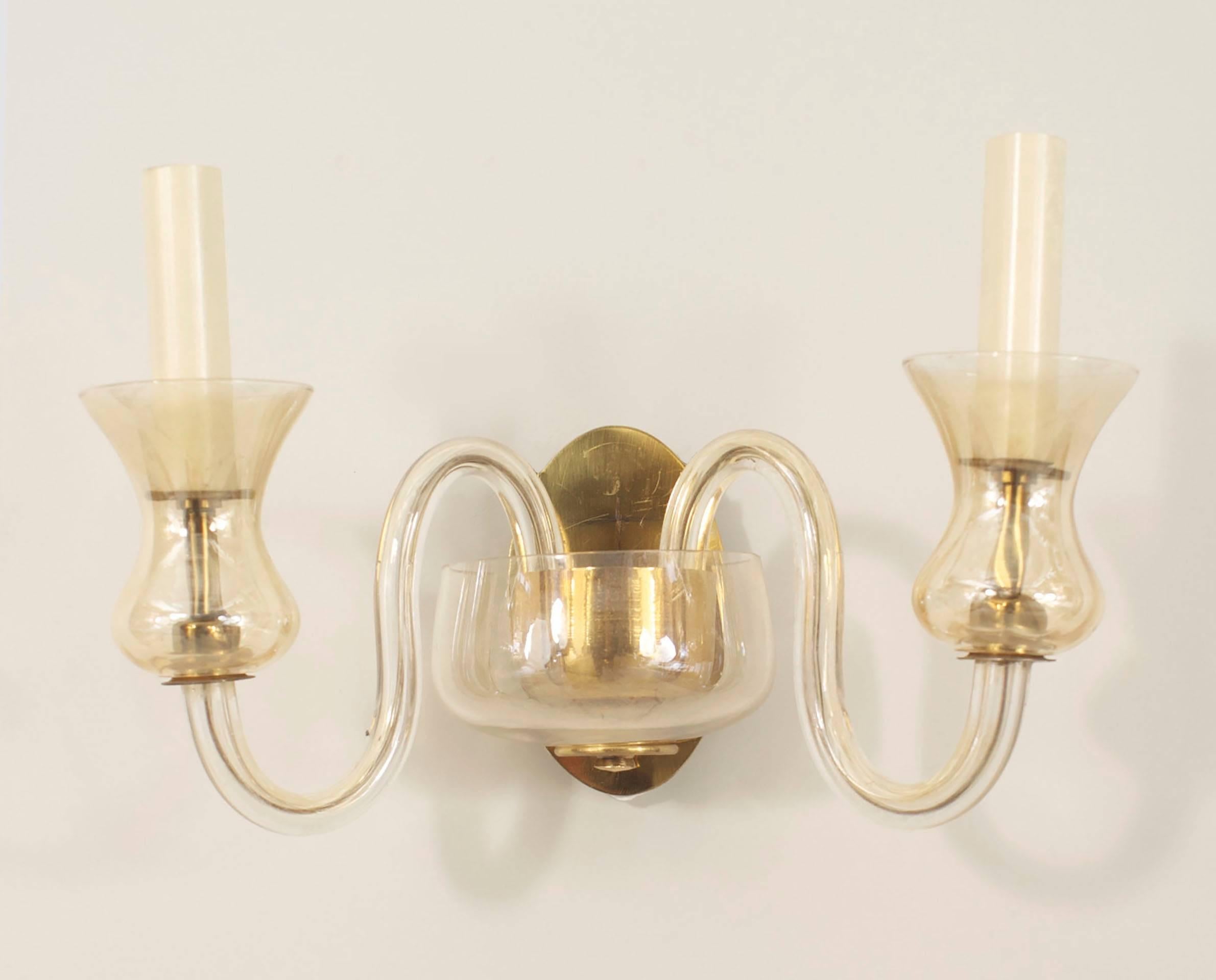 Pair of Italian Venetian (1940s) pink Murano glass wall sconces with two scroll-shaped movable arms supported by a brass backplate holding a shaped shade. (PRICED AS Pair)
