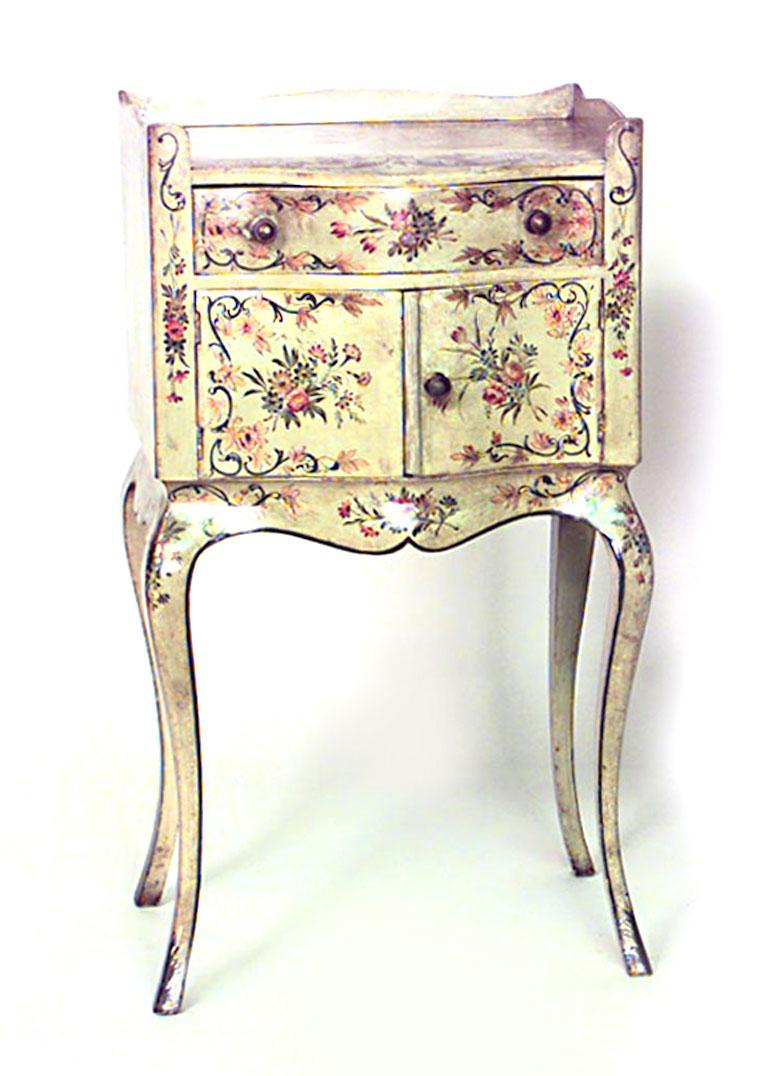 Pair of Italian Venetian style (19th-20th century) green painted and floral decorated bedside tables with two doors and one drawer with gallery.
 