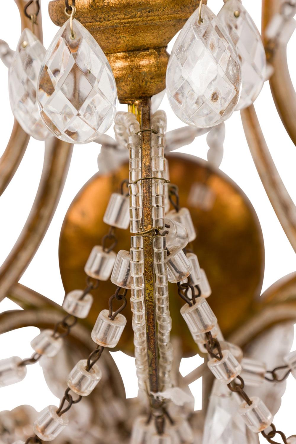 Pair of Italian Venetian Style Crystal and Metal Scroll Arm Sconces siglo XX en venta