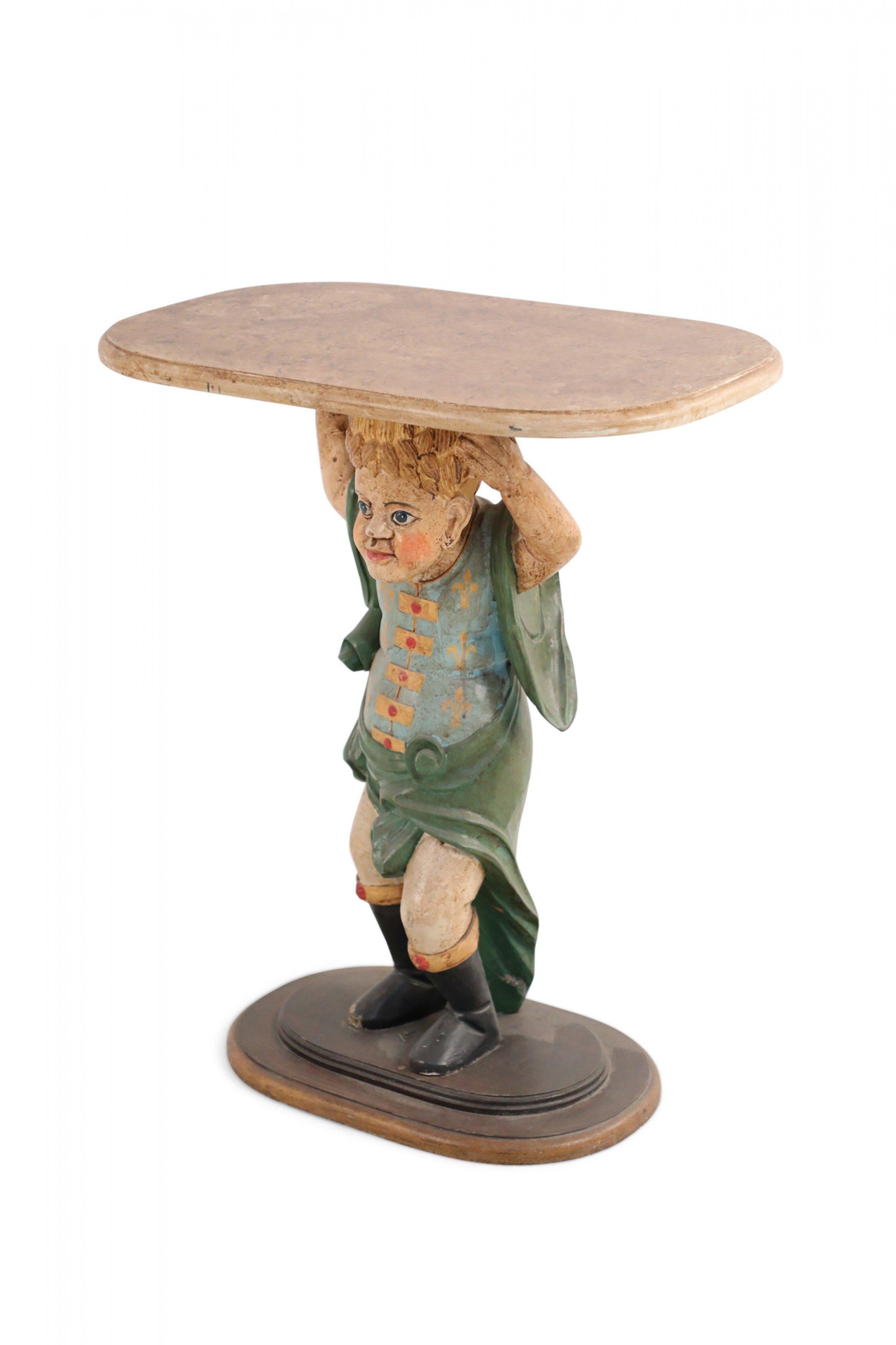 Pair of Italian Venetian-style side tables in polychrome carved wood comprised of figurative statues affixed on oval, brown-painted and gilded bases, holding faux marble oval table tops (priced as pair).
       