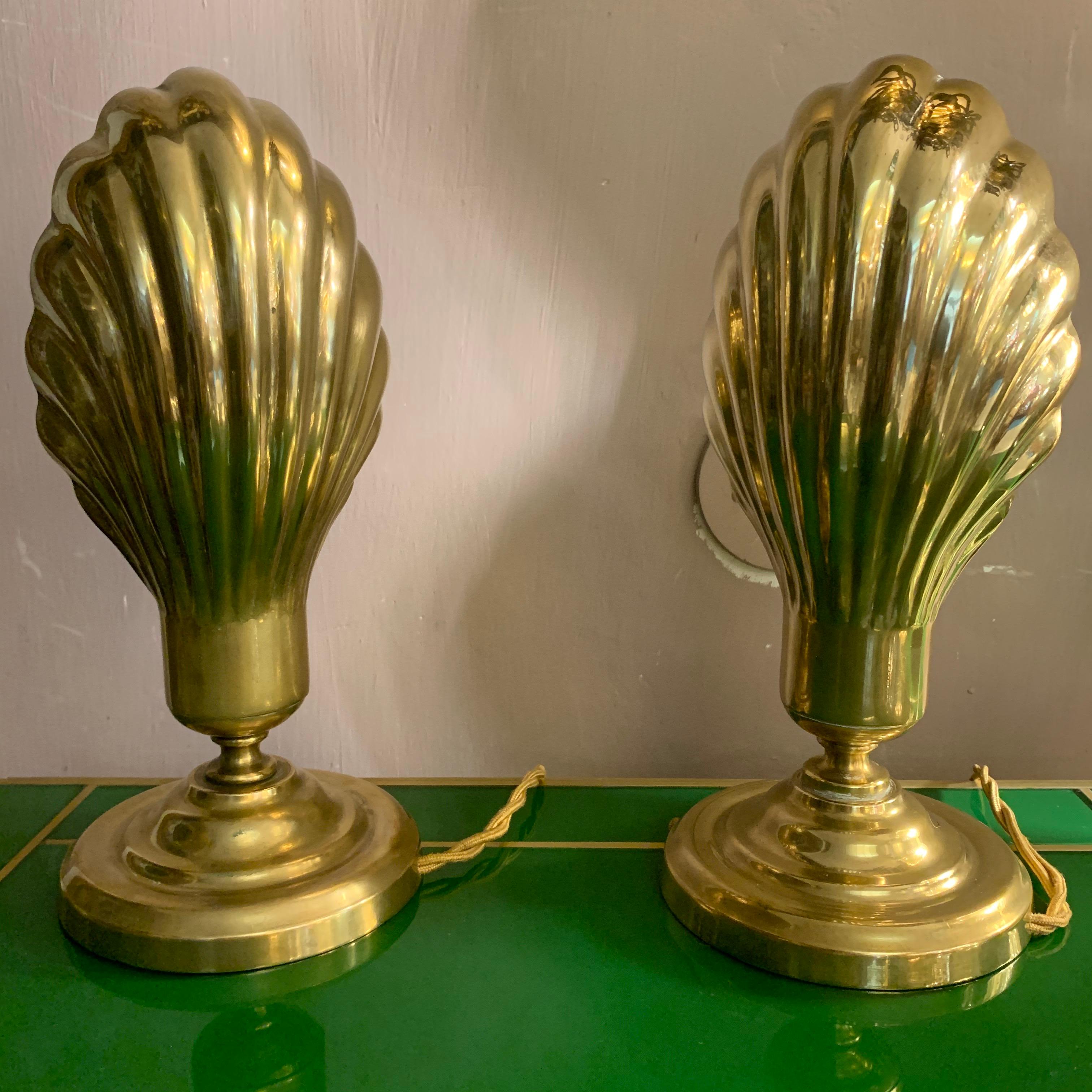 Pair of Italian vintage brass clam shell nightstand lamps.
One bulb per light.
 
