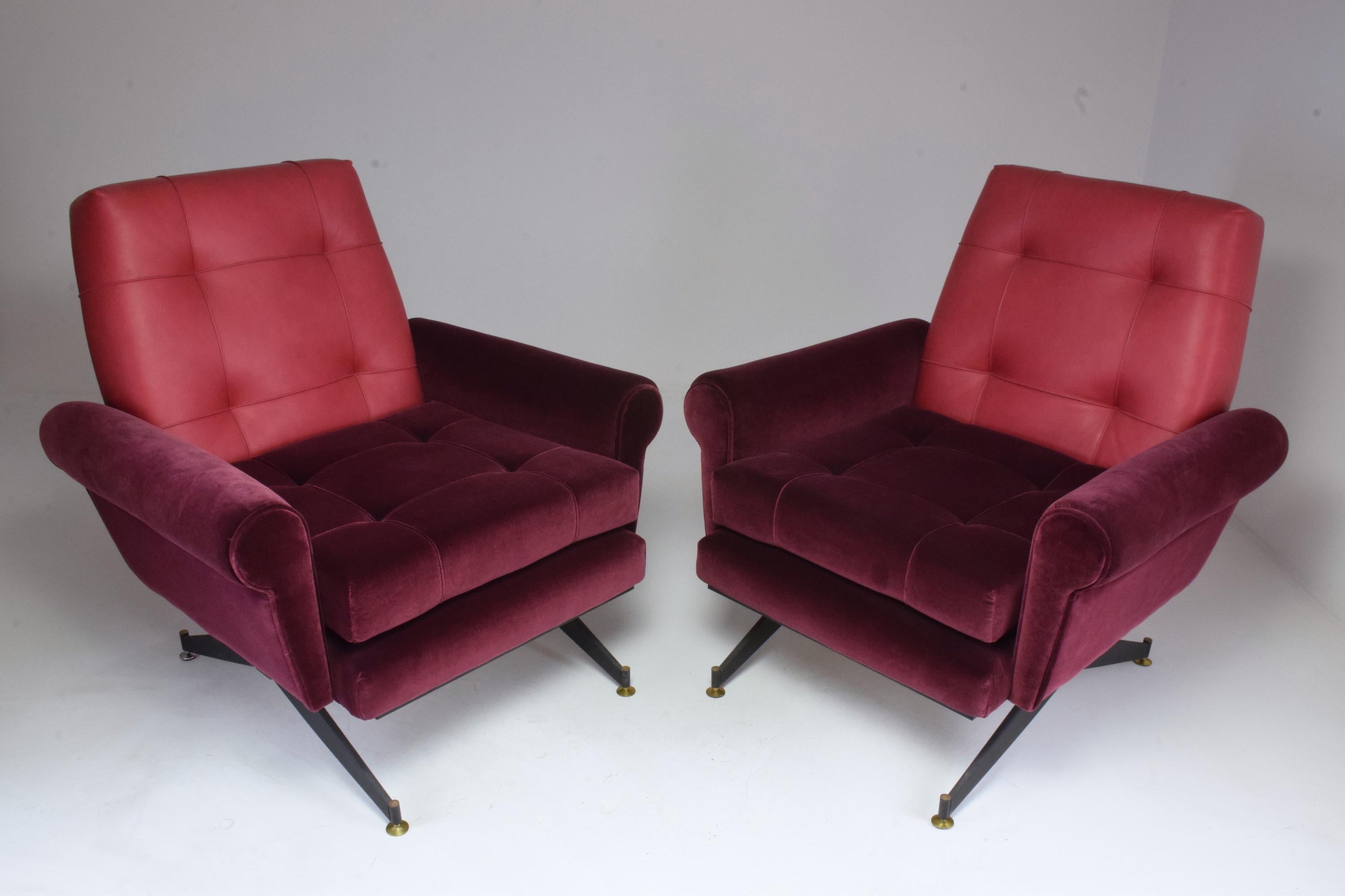 Pair of Italian 20th century vintage armchairs circa 1950s with steel compass legs, comfortable depth, in fully restored condition: re-upholstered in a high quality Lelièvre Paris red velvet and Italian leather backrest with new foam