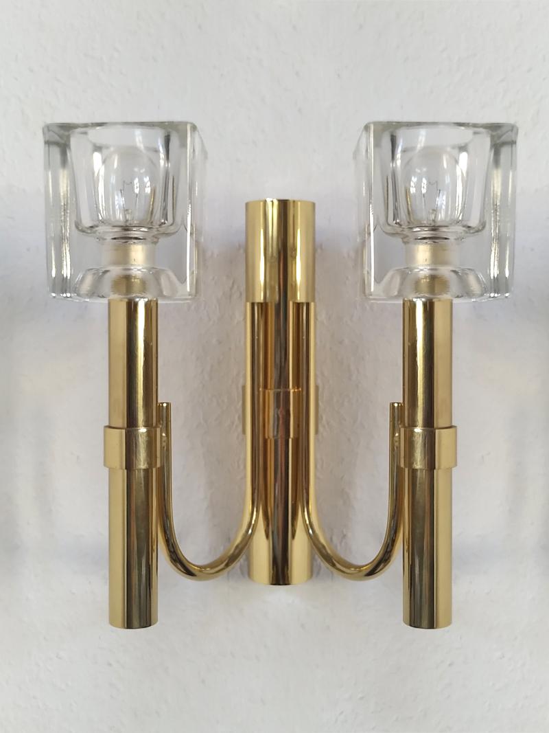 Pair of beautiful sculptural minimalist glass and brass sconces.
Italy, 1960s.