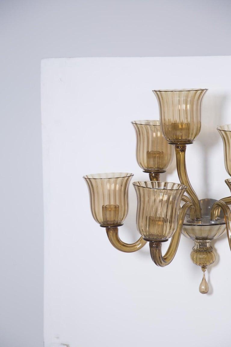 Mid-Century Modern Pair of Italian wall lamps by Venini in Glass Ambra For Sale