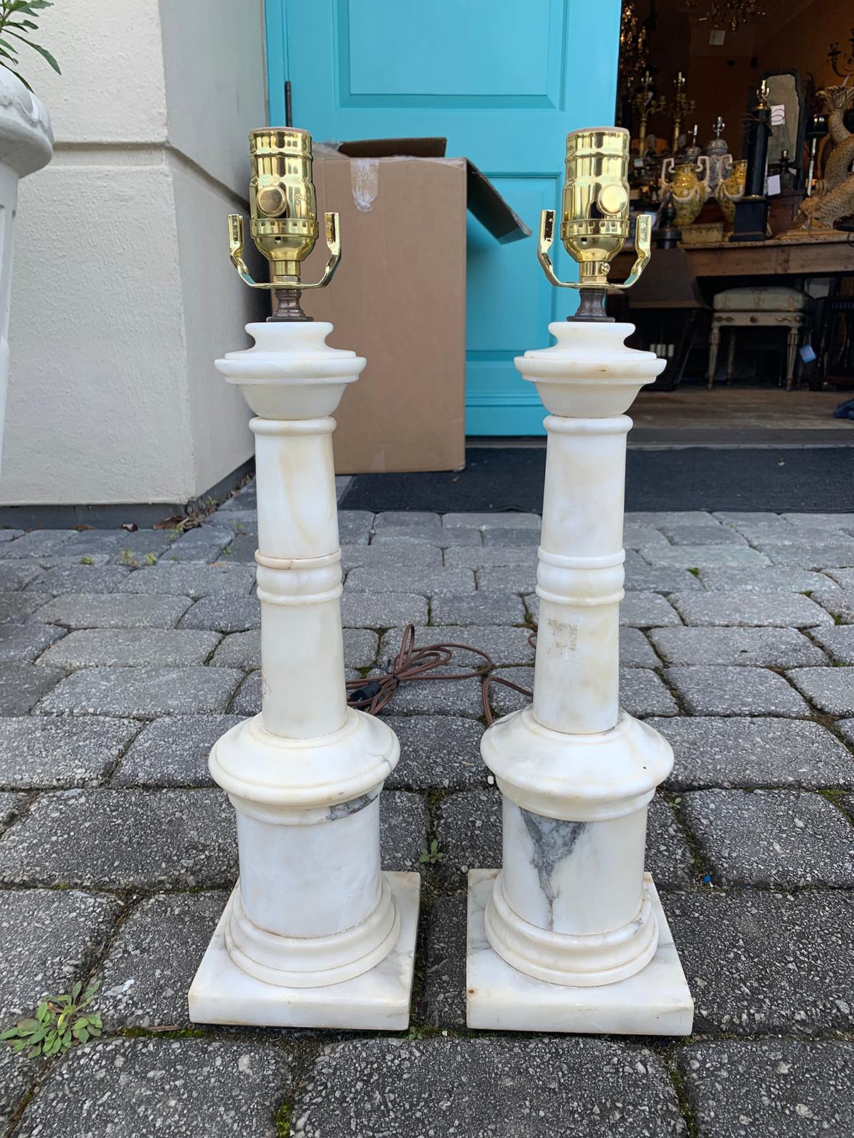 Pair of Italian white marble column table lamps, circa 1950s.
Brand new wiring.