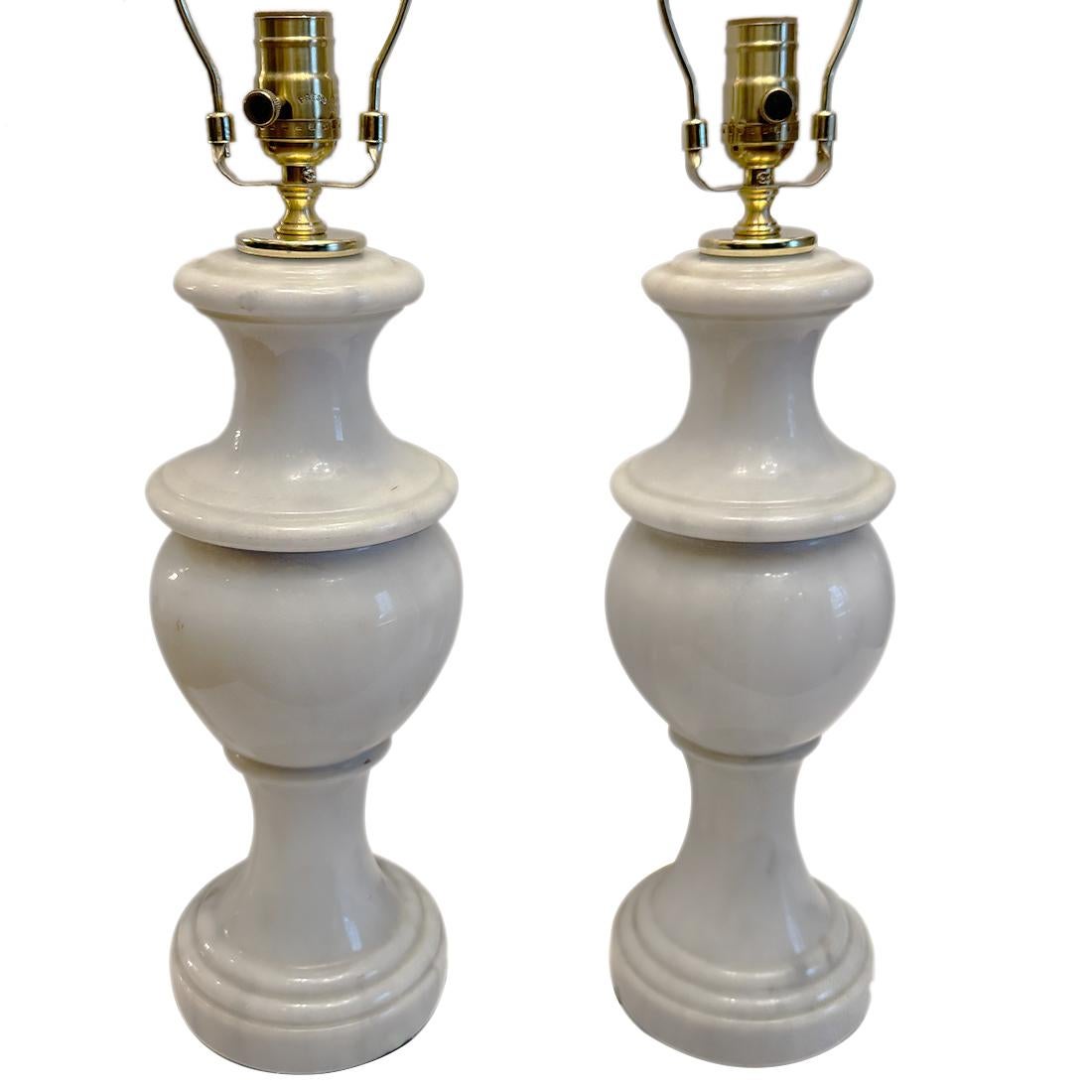 Pair of 1960's carved Italian table lamps.

Measurements:
Height of body: 17