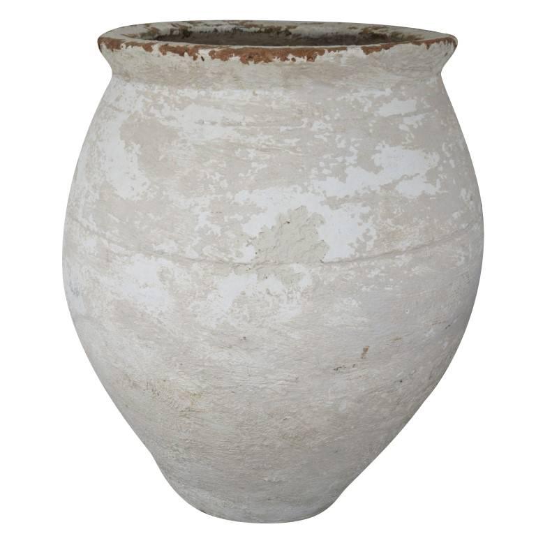 Originating in a 17th century Villa in the North of Rome these white terracotta vessels have a unique shape and a beautifully worn patina. Both are roughly 26 inches in diameter, one is 33.5 inches tall and the other is 31 inches tall.