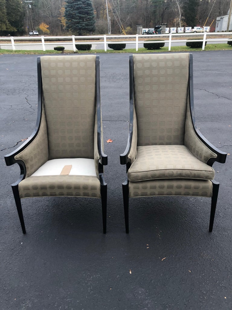 Amazing sleek and sexy Italian High back chairs. Not your traditional wing back. More narrow and upright . Missing one cushion but easy to match. Use the other cushion as a template. Classic black Lacquered wooden frame. Perfect designer look.