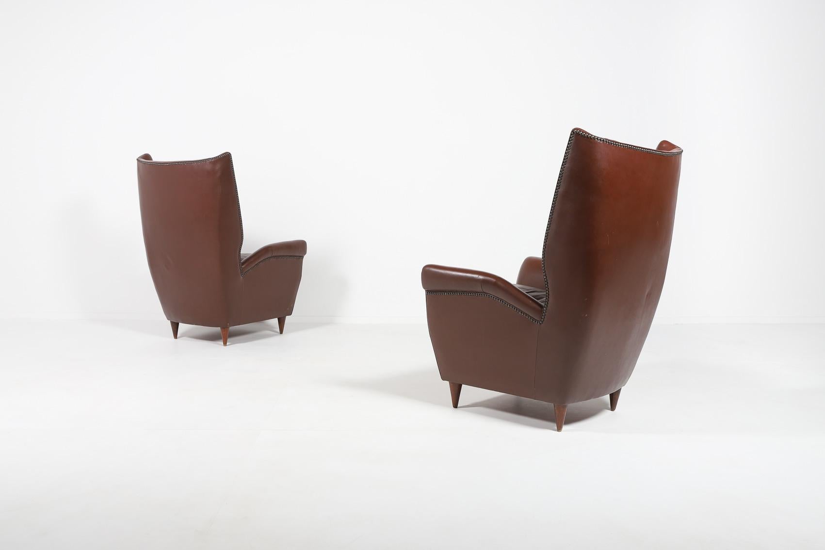 Mid-Century Modern Pair of Italian Wingback Lounge armchairs by Gio Ponti, 1950’s For Sale