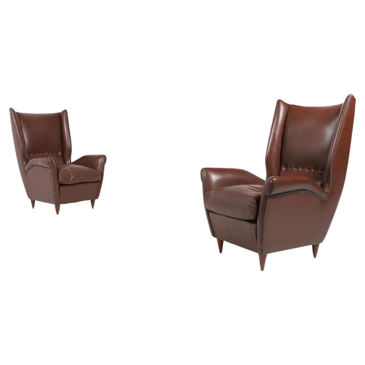 Pair of Italian Wingback Lounge armchairs by Gio Ponti, 1950’s For Sale