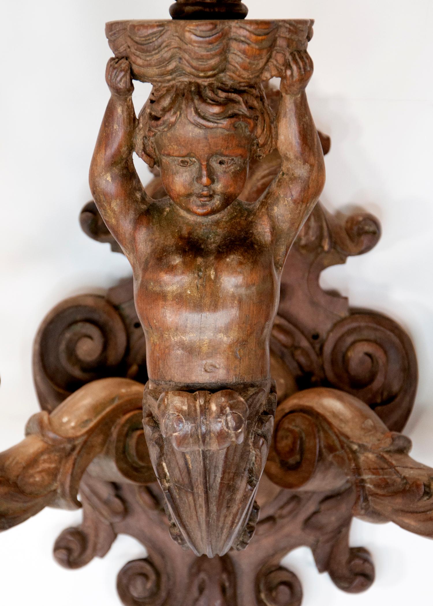 Pair of Italian Wood Cherub Sconces In Good Condition For Sale In Palm Springs, CA
