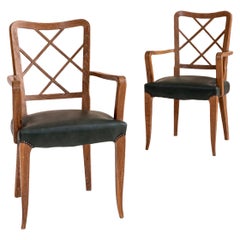 Pair of Italian wooden armchairs attributed to Paolo Buffa. Italy, 1950s