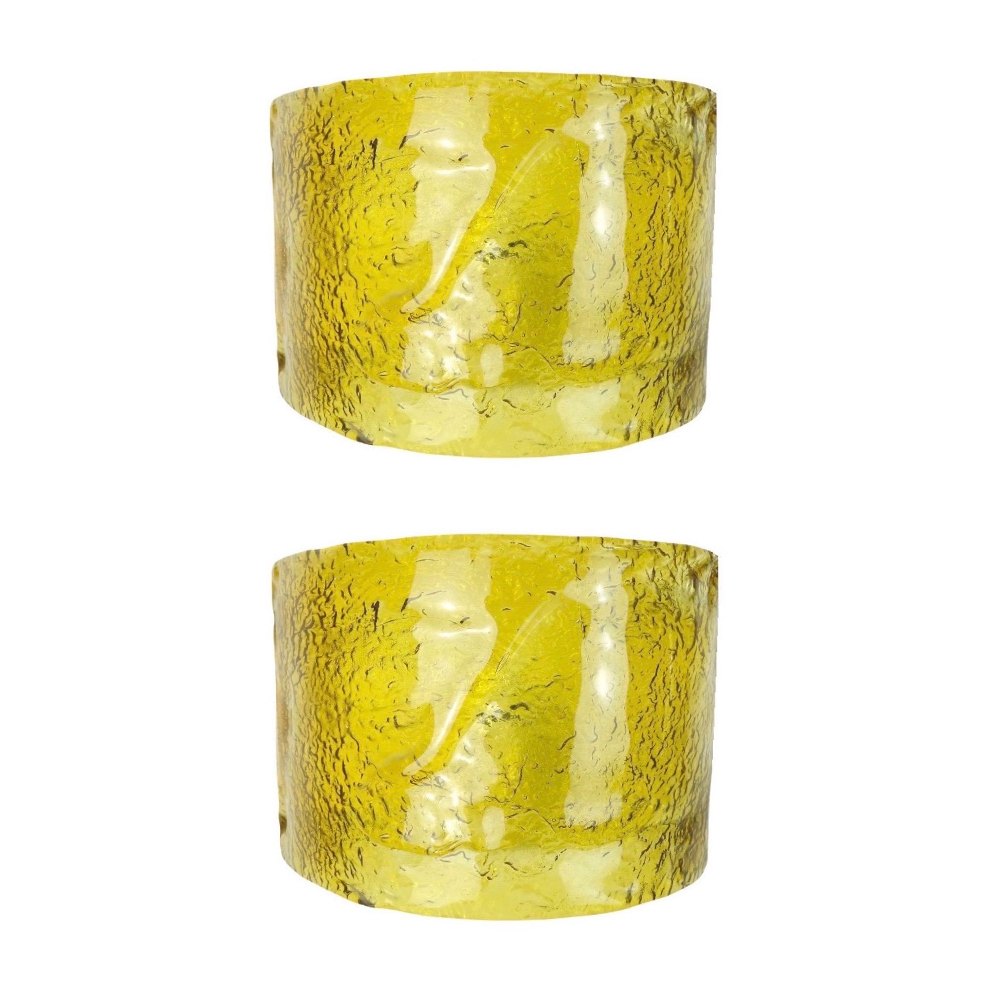 Cool, beautiful and unique Pair of Italian Yellow Amabar Murano glass Wall Sconces from 1970s by Carlo Nason.
These Sconces were made during the 1970s in Italy for the Venice Company “AV Mazzega” by Carlo Nason as Designer.
“AVMazzega” original