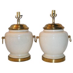 Paar elfenbeinfarbene Porzellan-Tischlampen