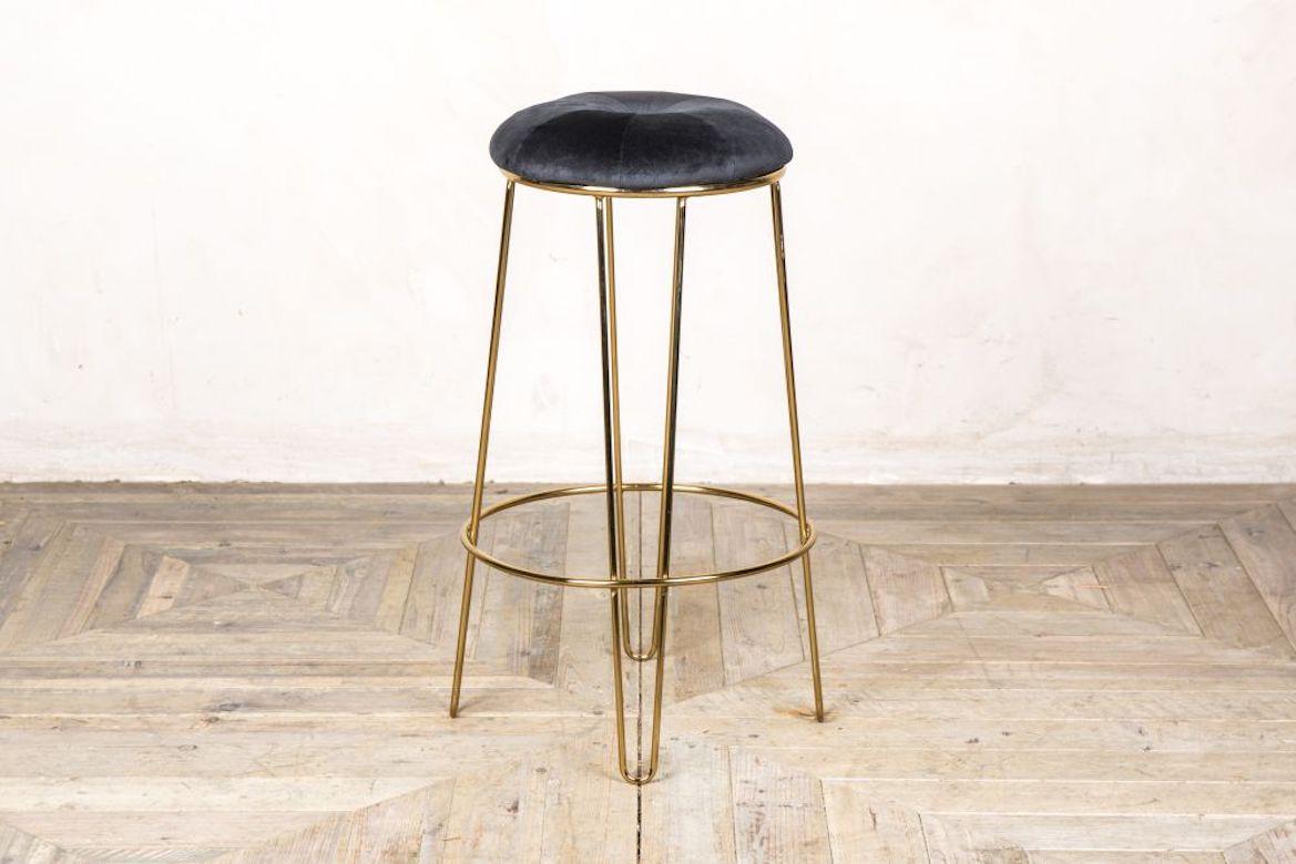A fine pair of Ivy velvet upholstered bar stools, 20th century.

Featuring a scandi inspired frame and beautiful velvet upholstered seats, the Ivy bar stool is of a unique design. Sold in pairs, the stools will suit a multitude of contemporary