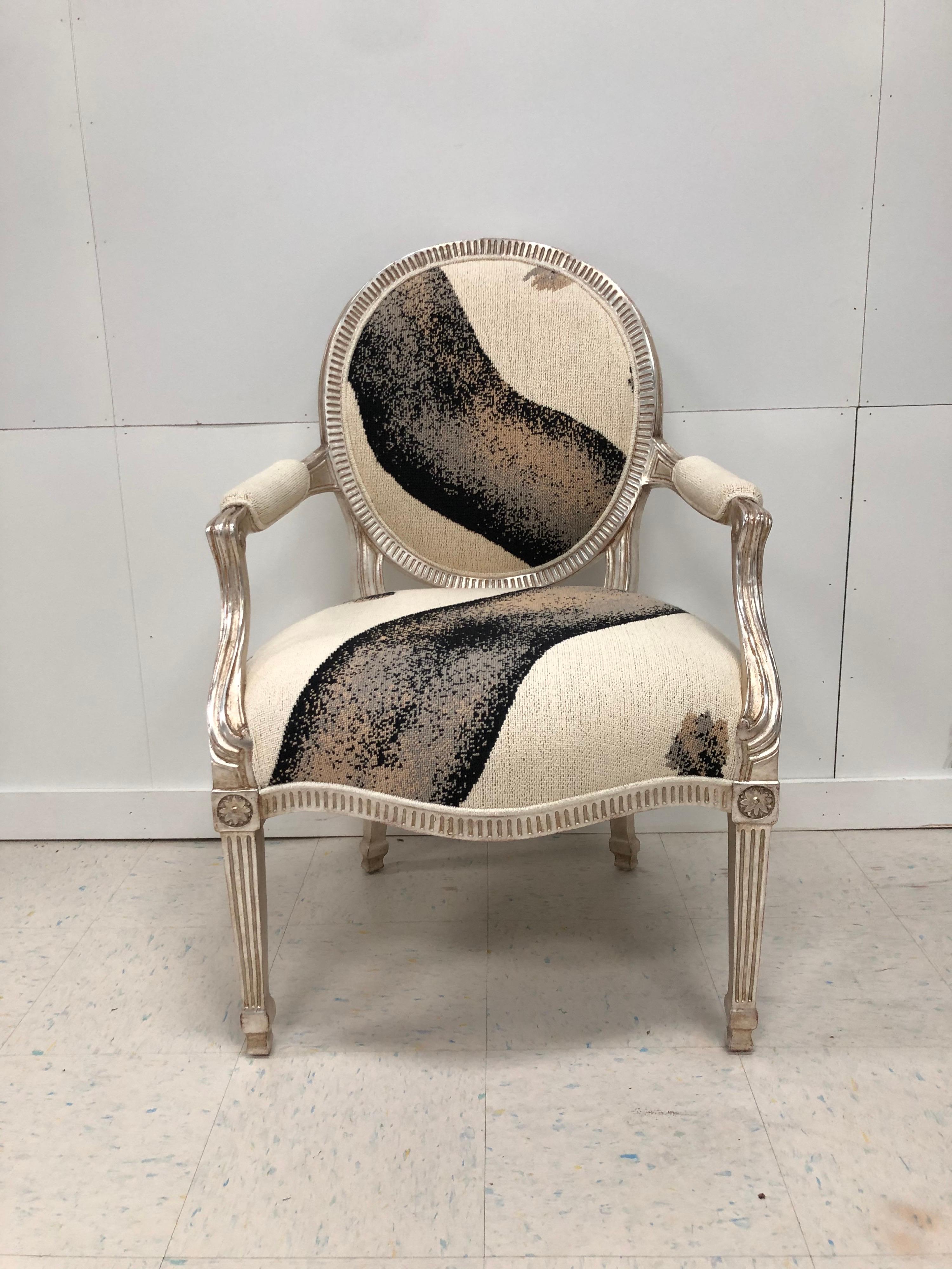 Custom upholstery on J. Robert Scott chairs with silver gilt. The pair are in good condition.