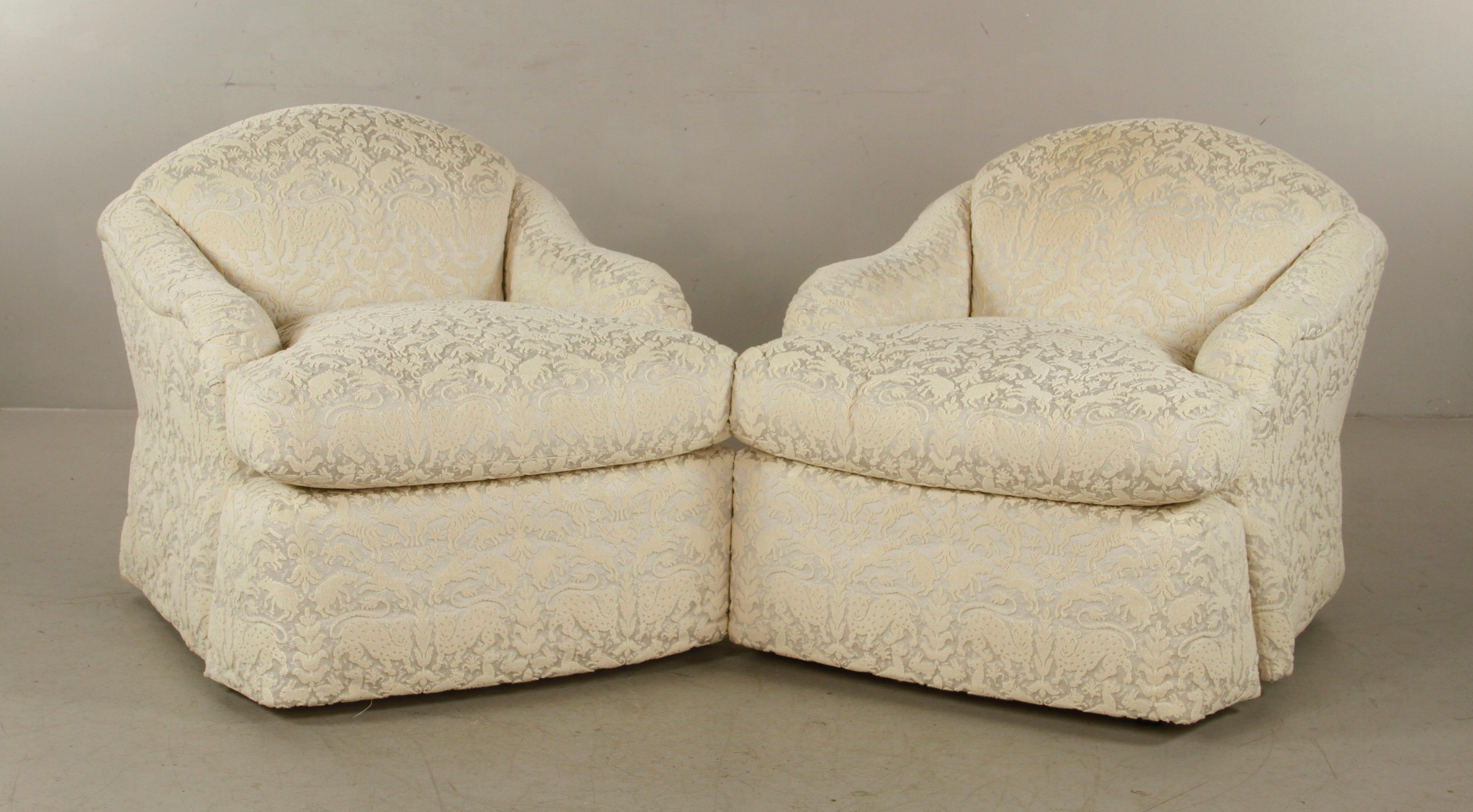 Pair of J. Robert Scott upholstered slope arm club chairs and matching ottoman in off white fabric with wonderful animal sculpted fabric showing lions, dogs rabbits, etc. Brand new ...Sir Gregory Lounge Chairs designed by Sally Sirkin Lewis measures