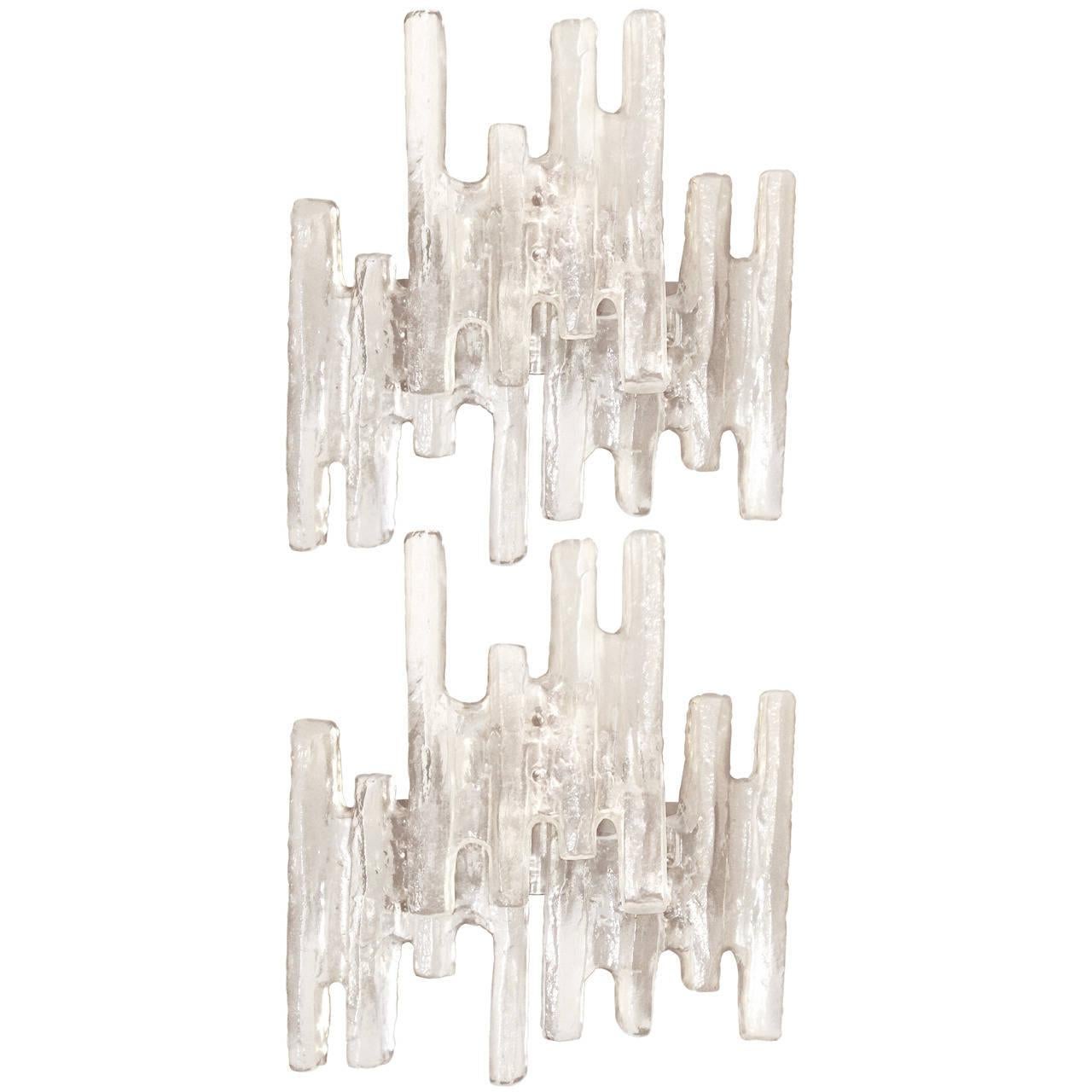 A pair of thick icy glass sconces in champagne by J. T. Kalmar.

Austrian, Circa 1960's