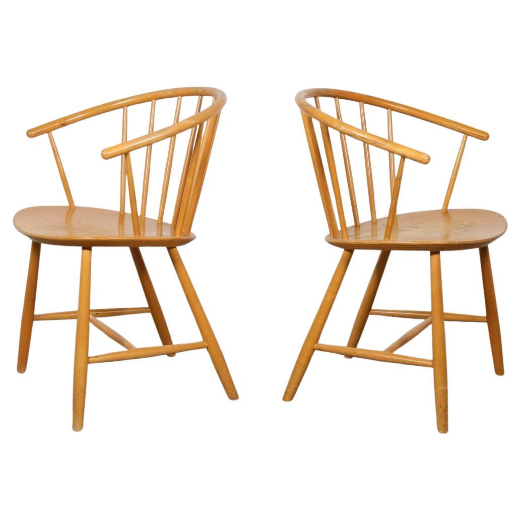 Pair of J64 Danish Modern Armchairs by Ejvind Johansson For Sale