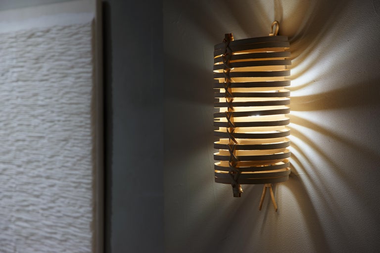 Pair of J.A. Coderch 'Junco' Rattan Cane Wall Lamps for Tunds at 1stDibs