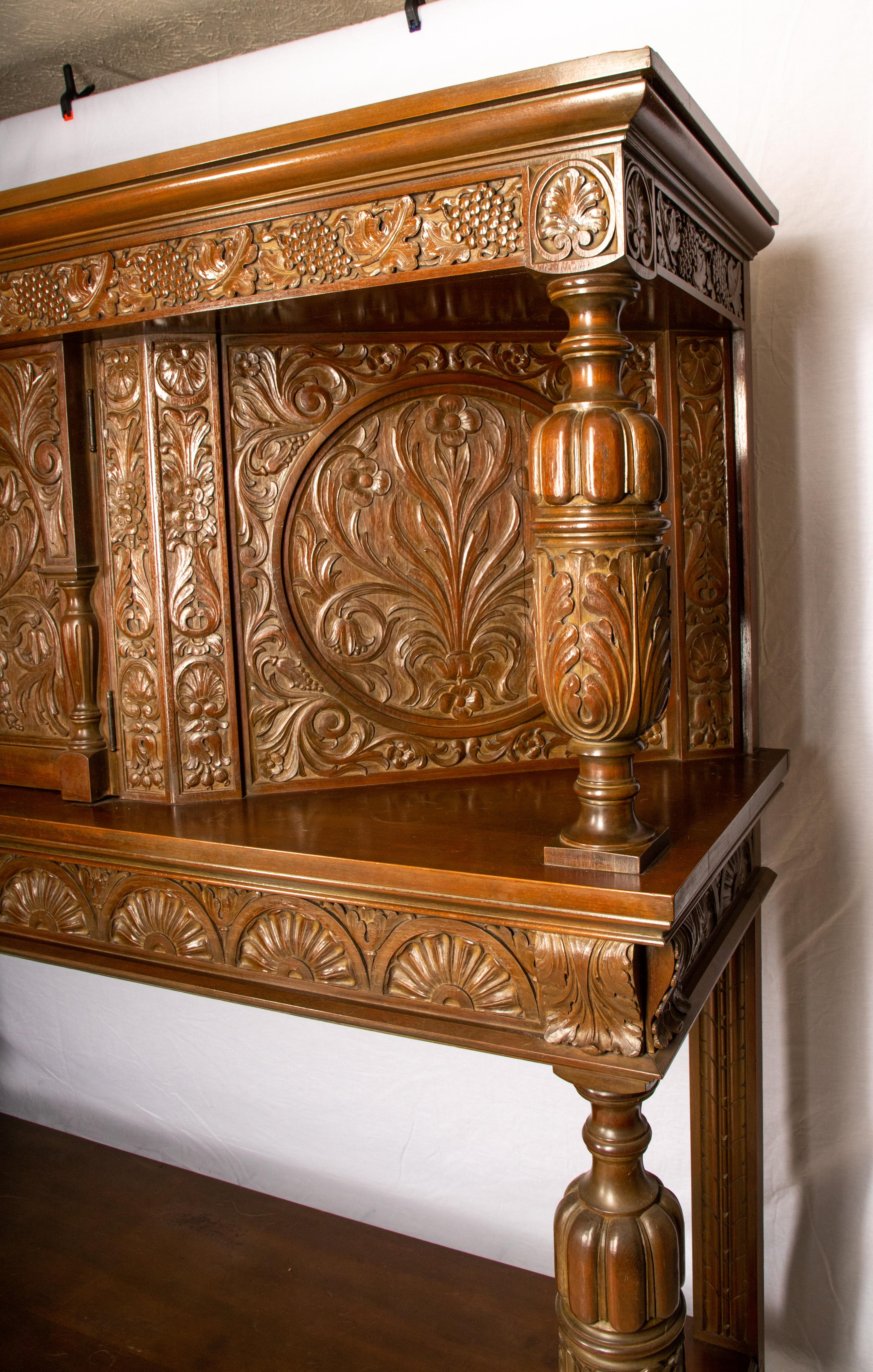 Hand-Carved Pair of Jacobean Revival Monumental Court Cupboards For Sale