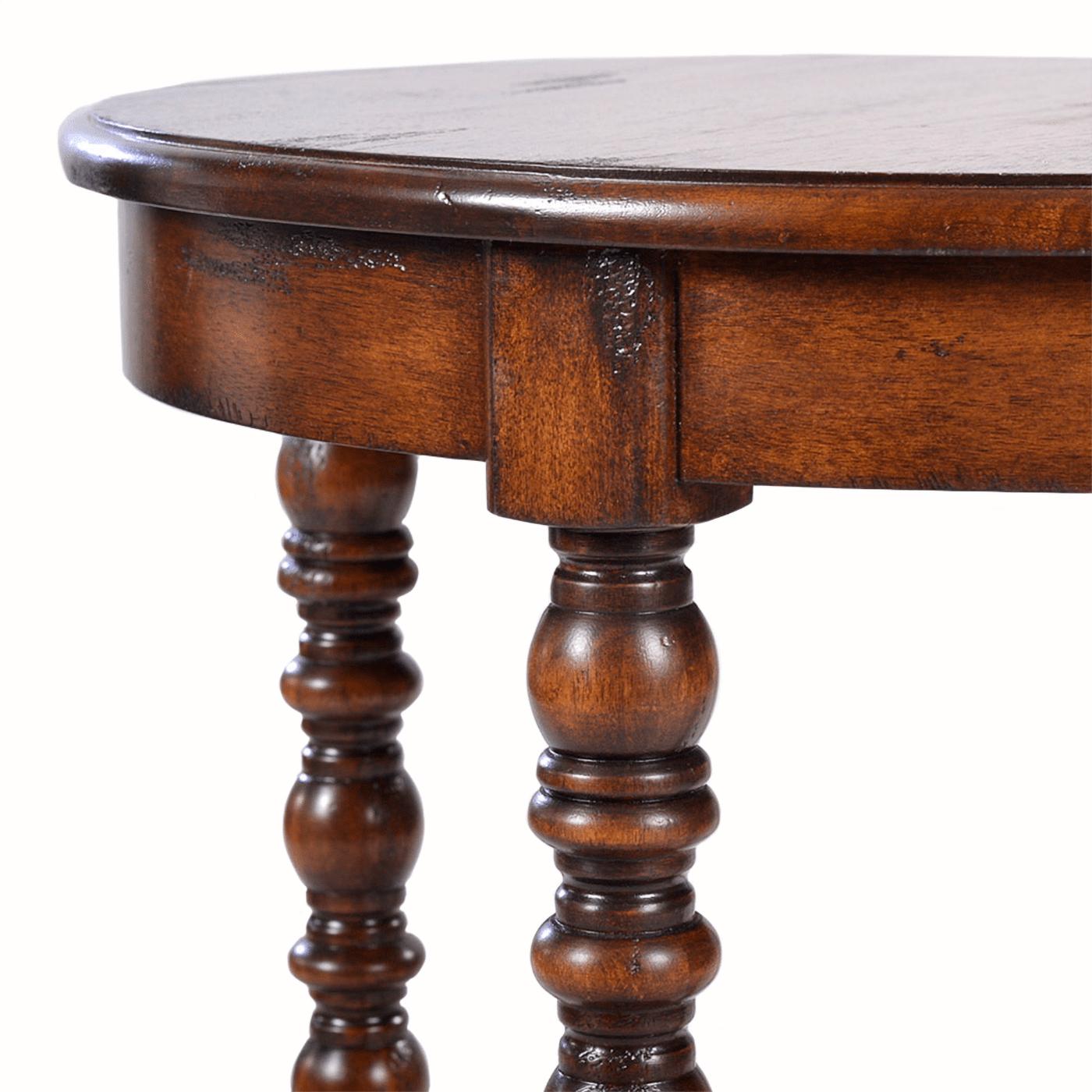 A Jacobean style round side table with an ogee top edge, in our distressed rustic country wood tone with natural highlights, with a hand rubbed satin finish.

Dimensions: 24