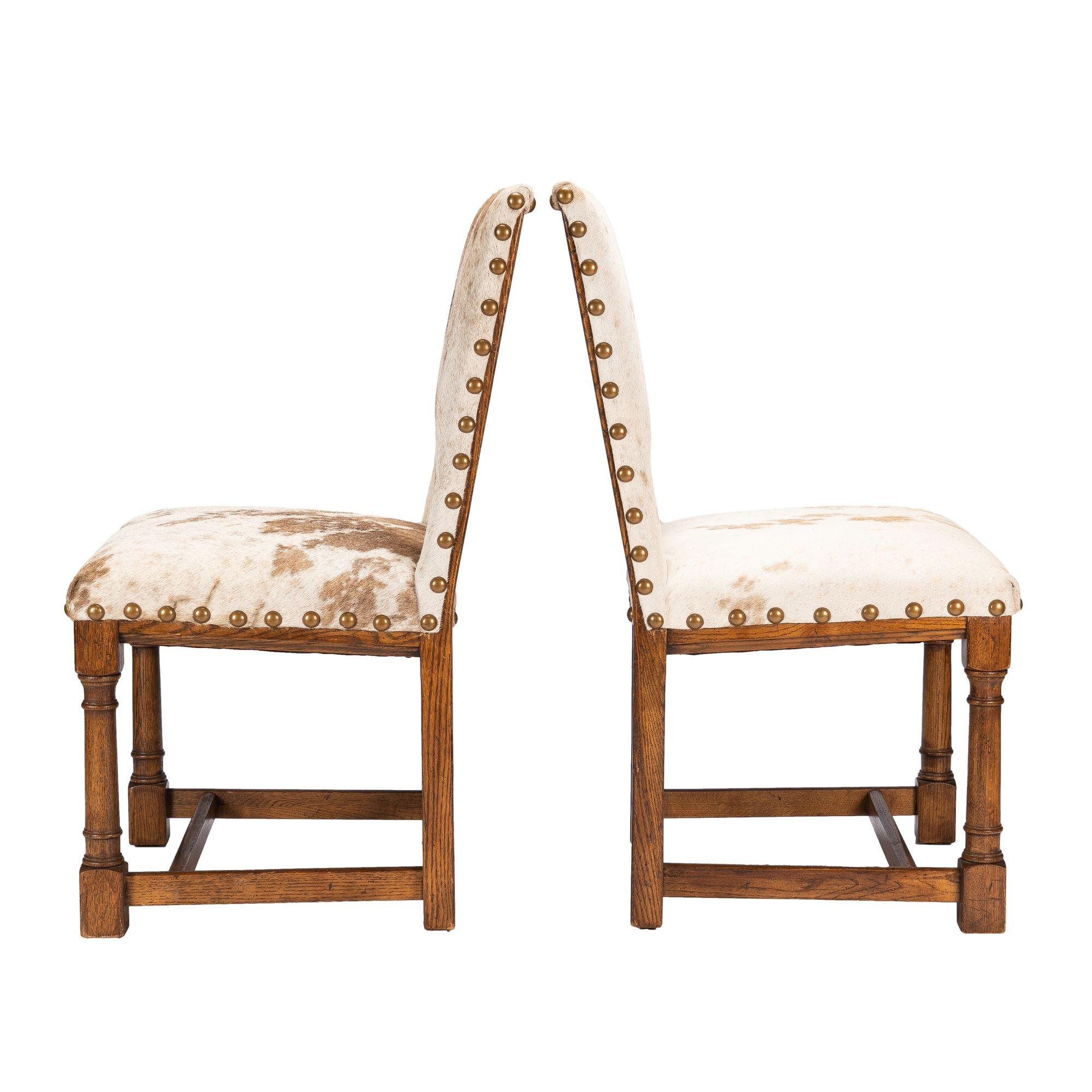 Pair of Jacobean style hair on hide oak side chairs, 1920-35 For Sale 2