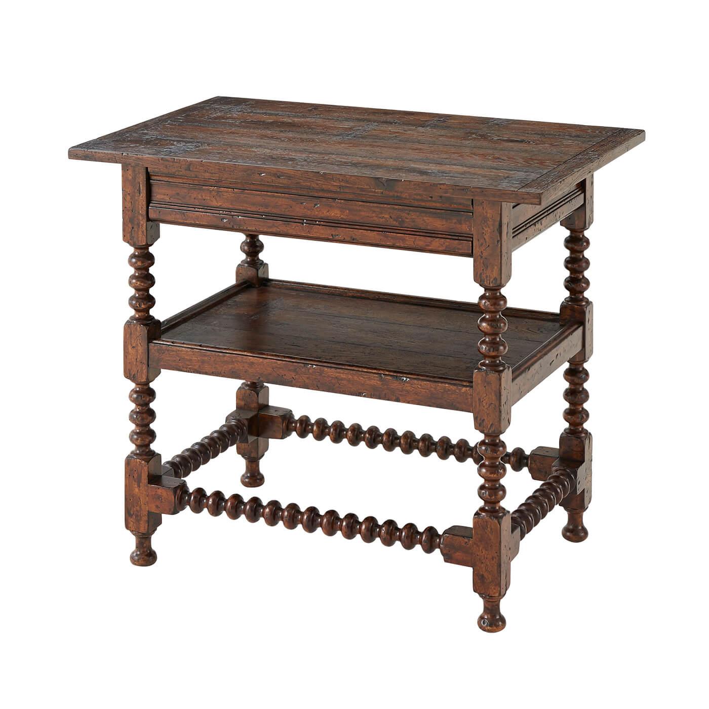 A Jacobean style rustic mahogany and reclaimed oak side table, the rectangular planked and breadboard top above a molded frieze, on bobbin turned and block legs joined by a boarded tier and bobbin stretchers below.

Dimensions: 31.5