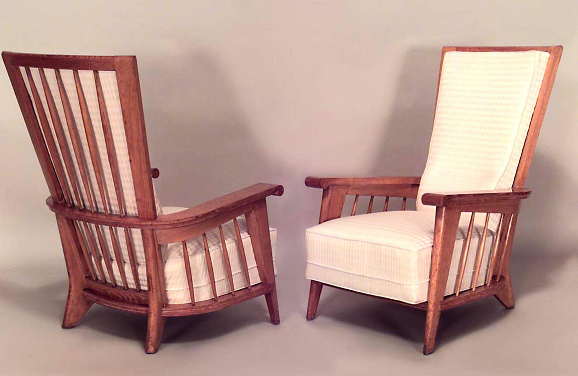 Pair of French Mid-Century (1940s) oak high back Armchairs with open spindle design sides and upholstered seat and back (Attributed to JACQUES ADNET) (PRICED AS Pair)
