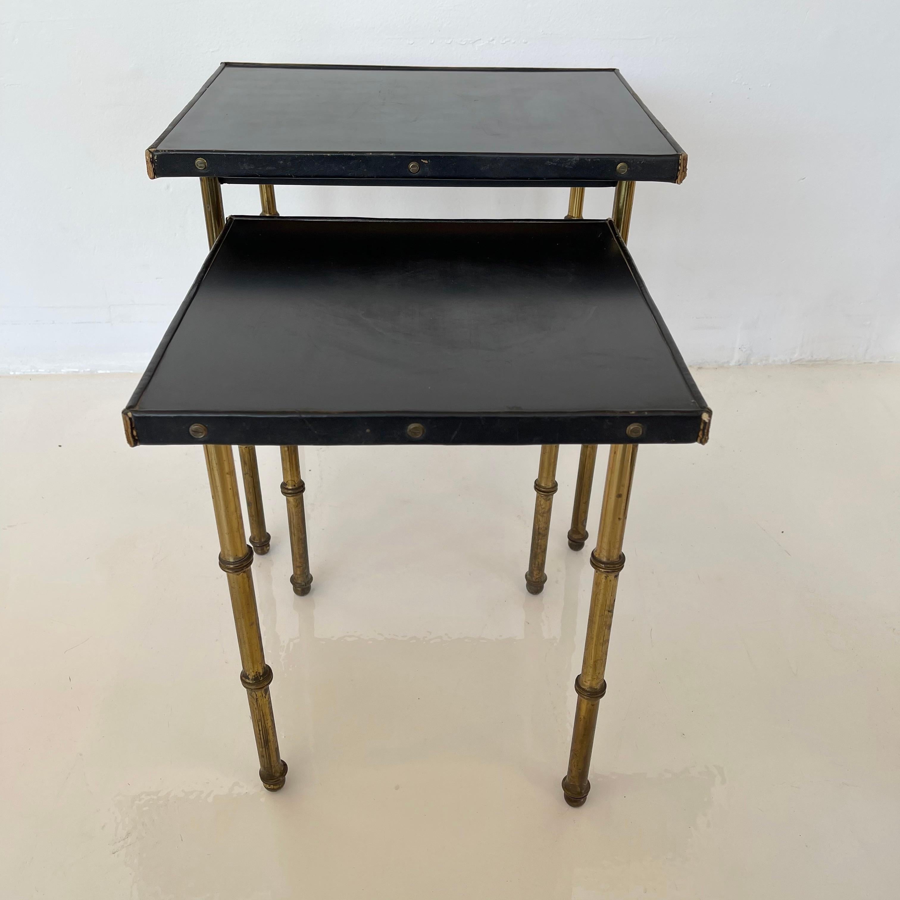 French Pair of Jacques Adnet Leather and Brass Nesting Tables, 1950s France