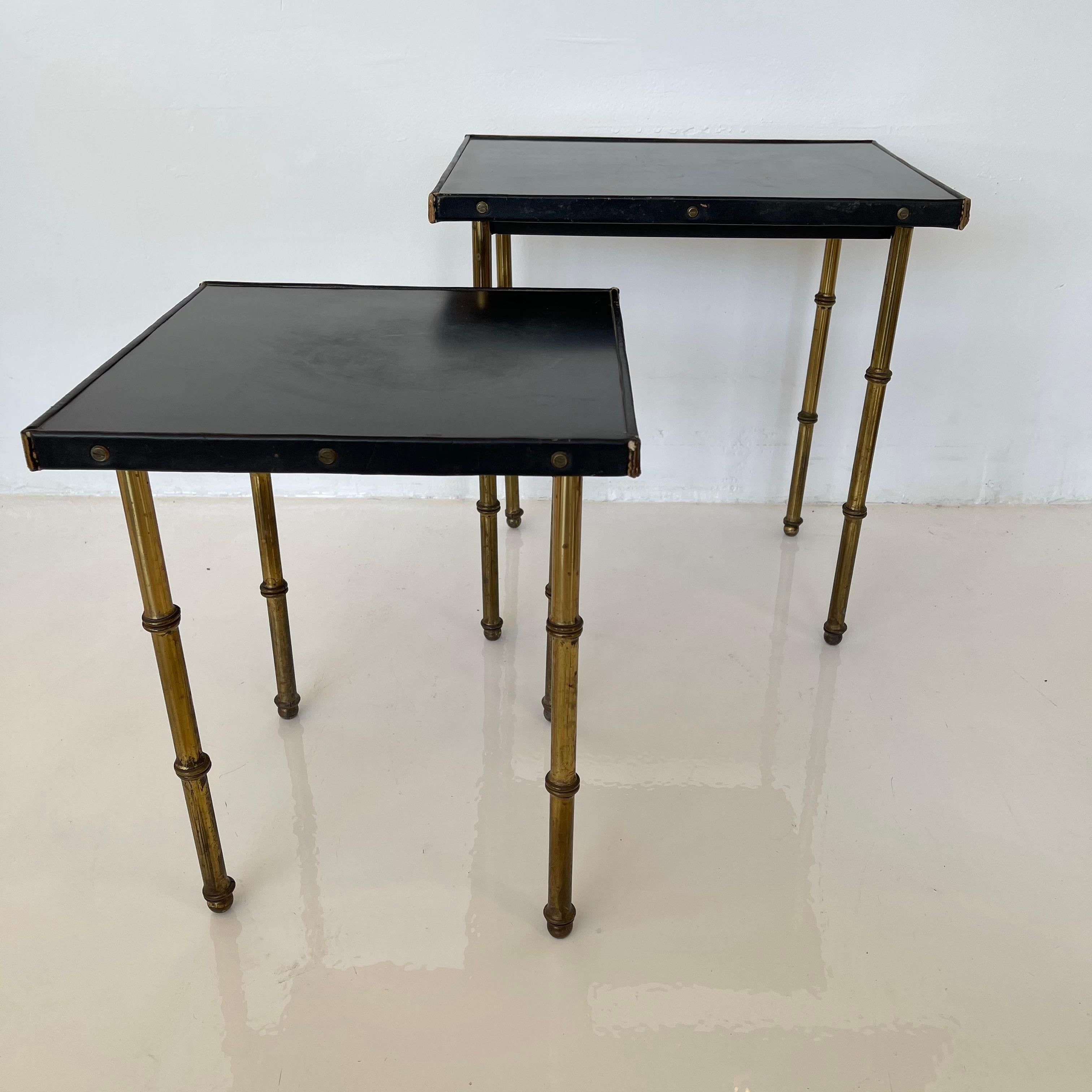 Mid-20th Century Pair of Jacques Adnet Leather and Brass Nesting Tables, 1950s France