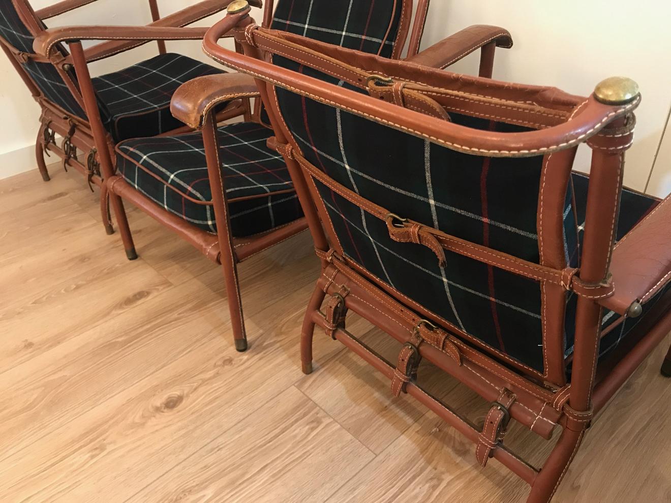 Brass Pair of Jacques Adnet Lounge Chairs