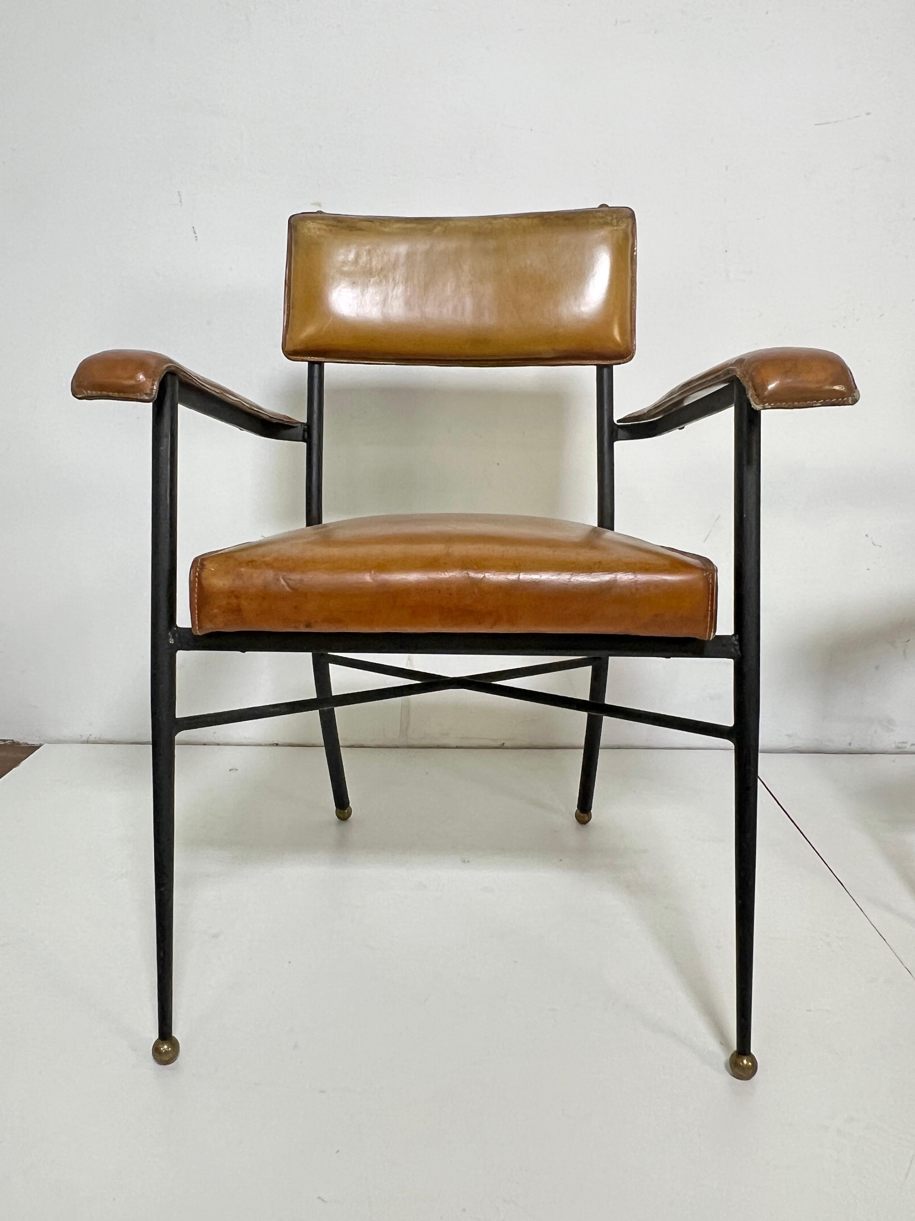 Mid-Century Modern Pair of Jacques Adnet Saddle Leather and Wrought Iron Armchairs Circa 1940s en vente