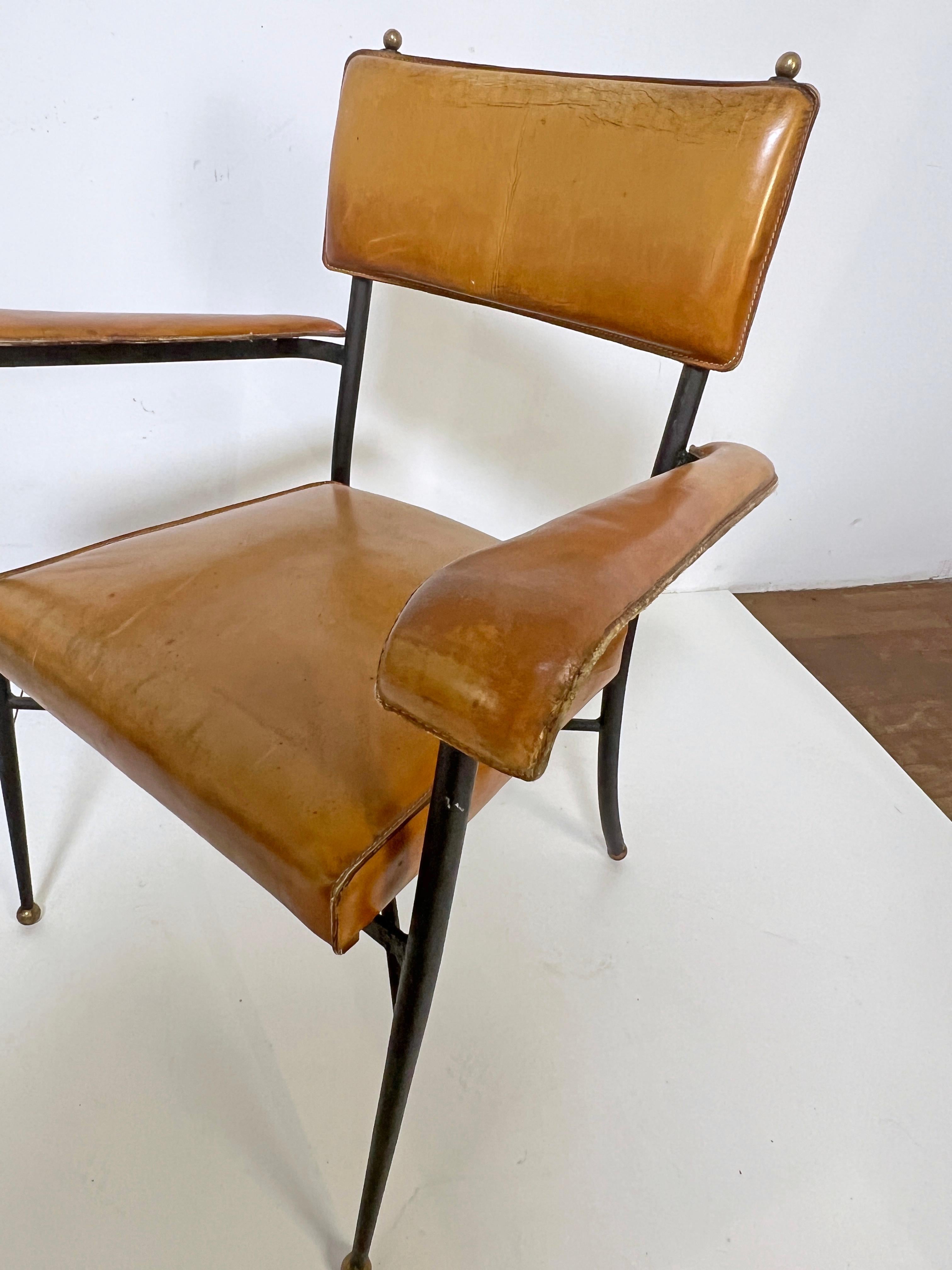 Milieu du XXe siècle Pair of Jacques Adnet Saddle Leather and Wrought Iron Armchairs Circa 1940s en vente