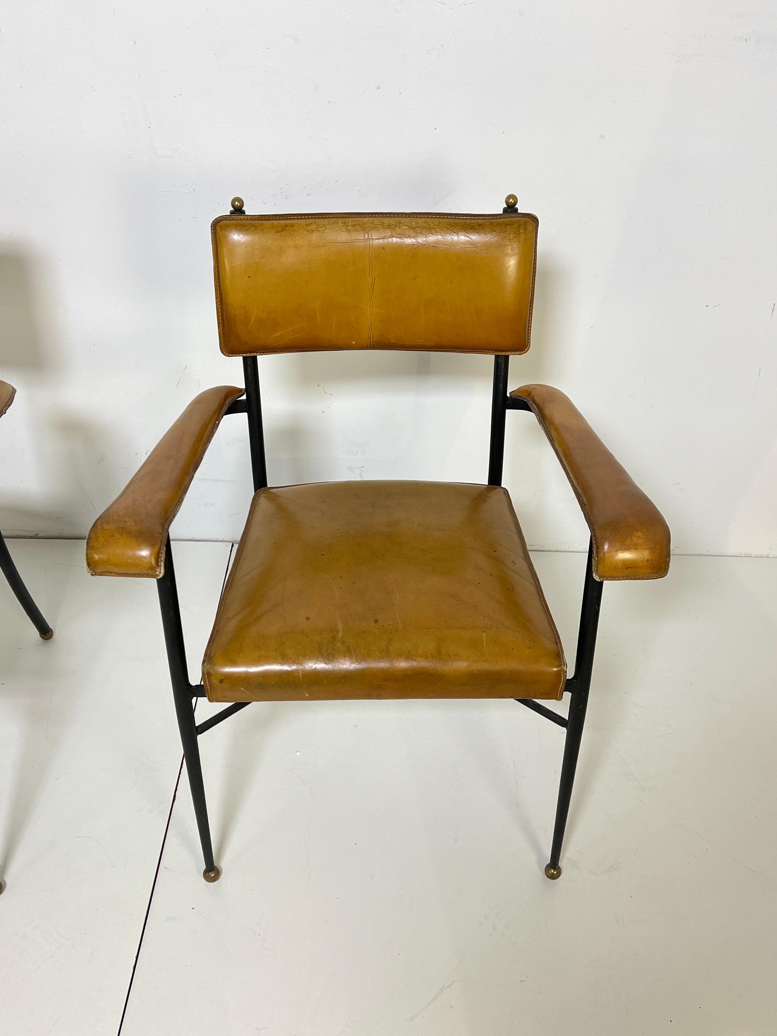 Bronze Pair of Jacques Adnet Saddle Leather and Wrought Iron Armchairs Circa 1940s en vente