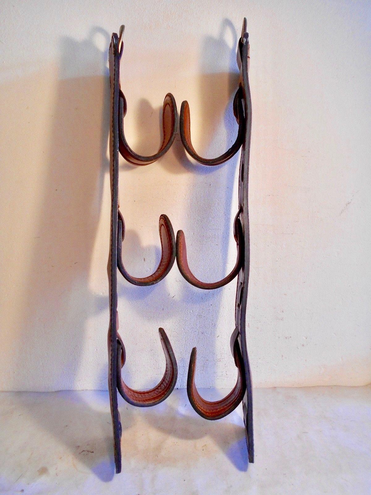 Pair of Jacques Adnet Saddle Leather Hooks 1