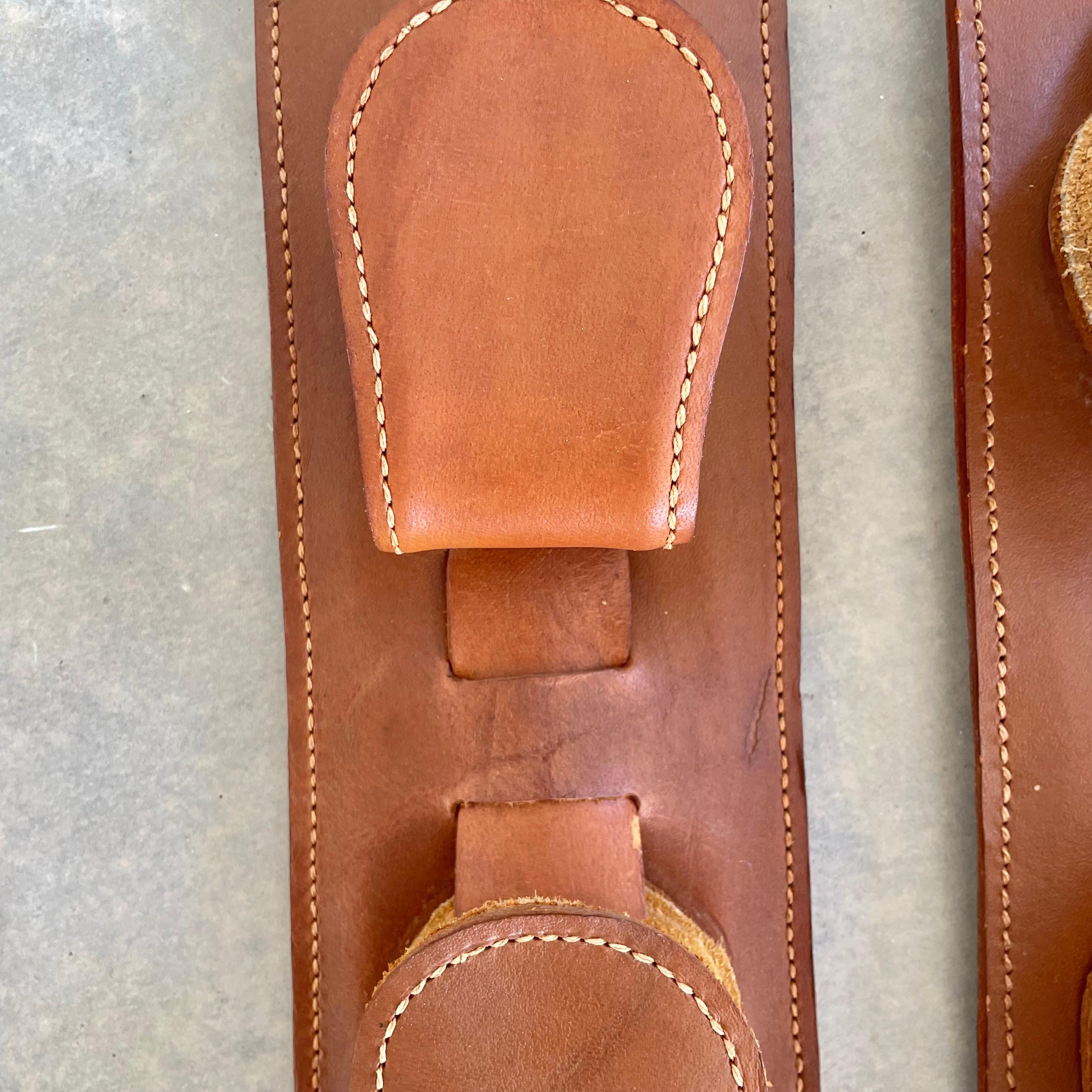 Pair of Jacques Adnet Style Leather Tongue Hooks In Good Condition For Sale In Los Angeles, CA