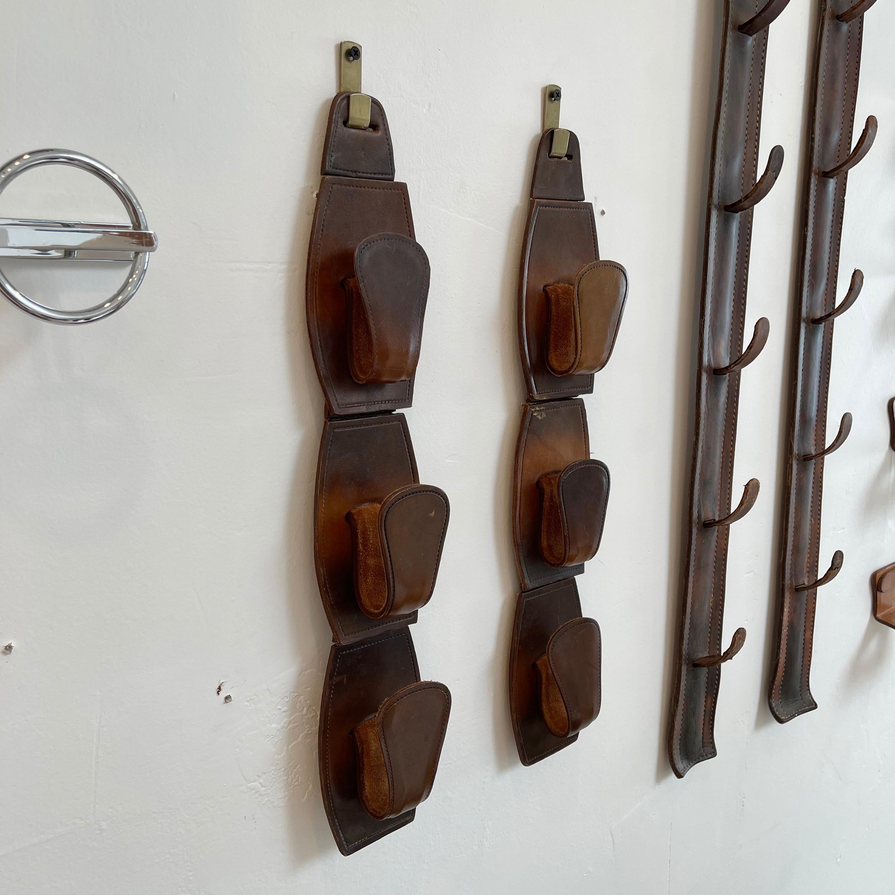 Mid-20th Century Pair of Jacques Adnet Style Saddle Leather Wall Hooks For Sale