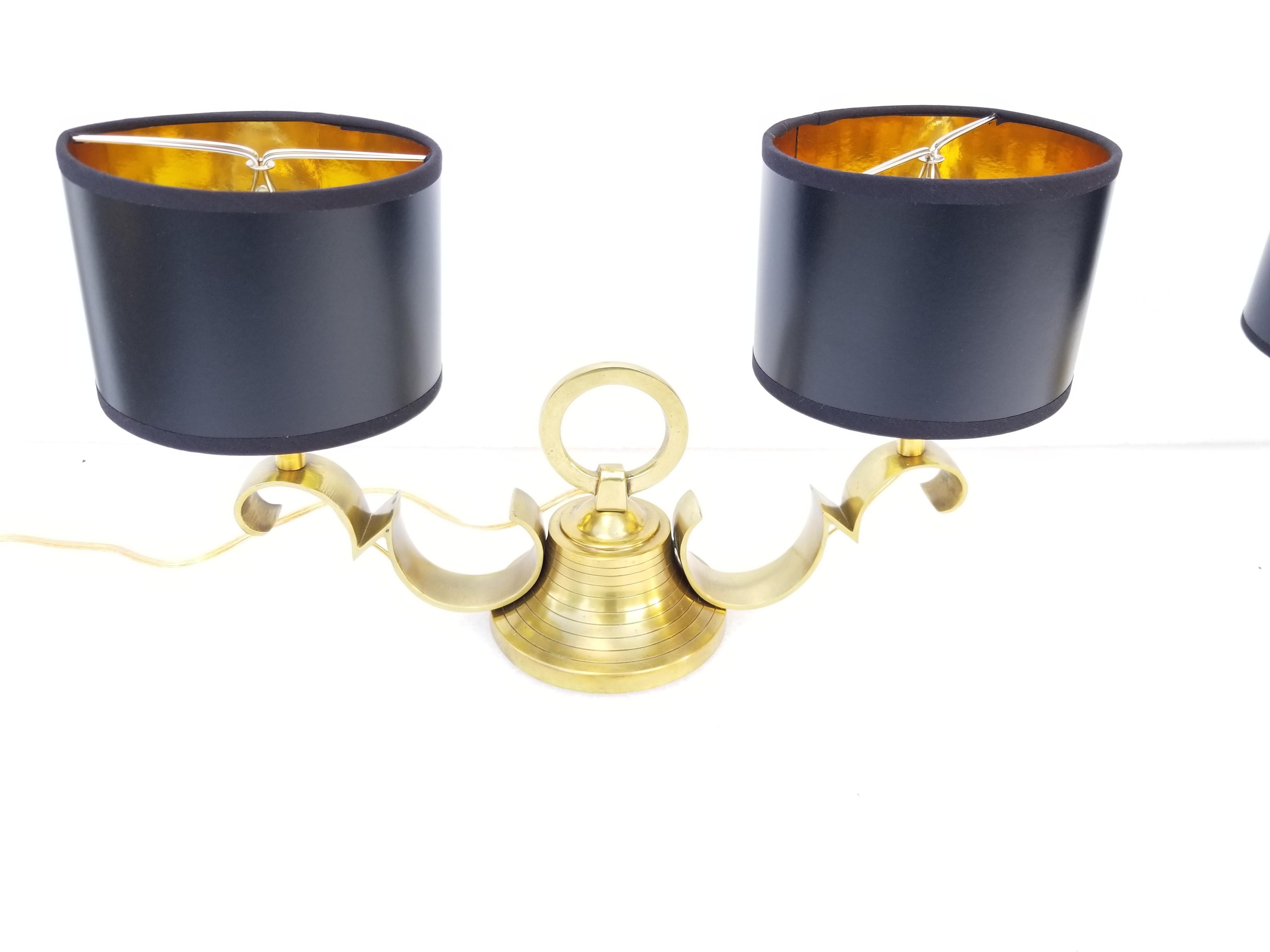 Pair of Jacques Adnet style table lamp, polished brass, 2-light 40 watts max bulb.
US rewired.