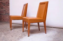 Paire de chaises d'appoint Jacques Quinet en cuir et acajou